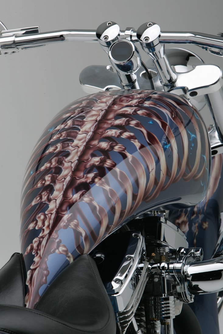 Devil's Advocate — front tank view, ribcage airbrushing detail