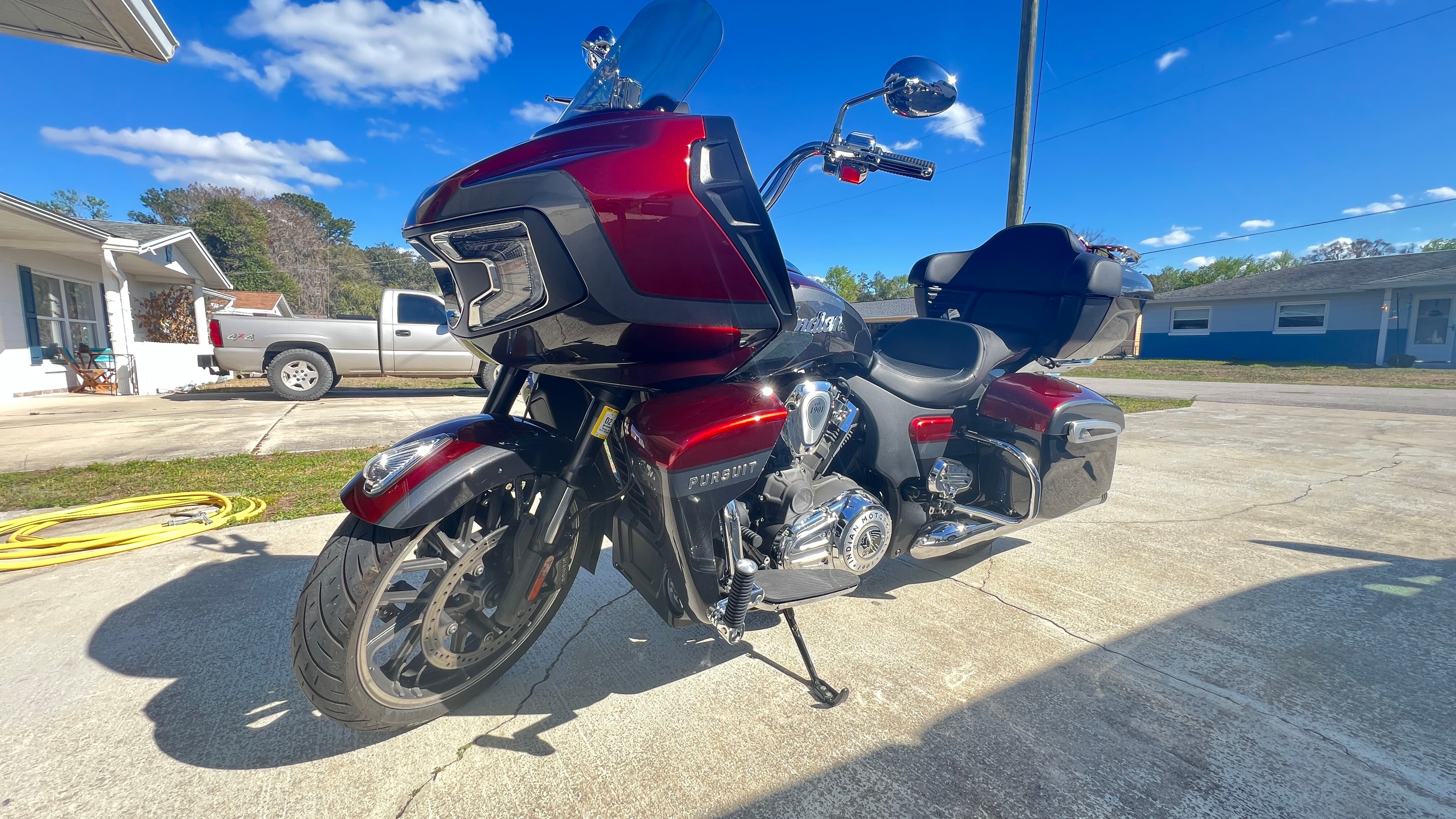 Indian Pursuit Limited — completed paint, full left-side profile in driveway
