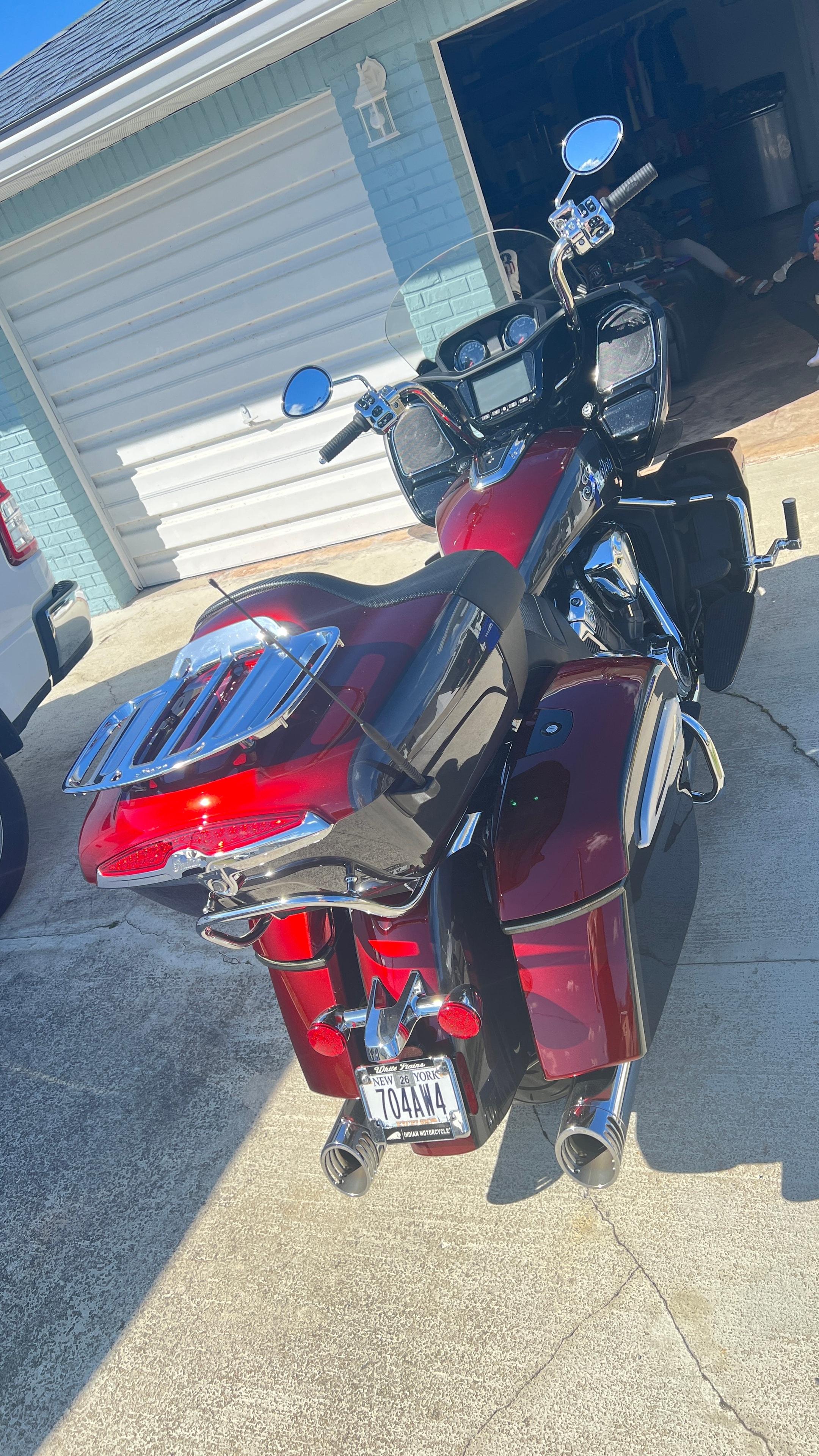 Indian Pursuit Limited — completed paint, front straight-on view in driveway