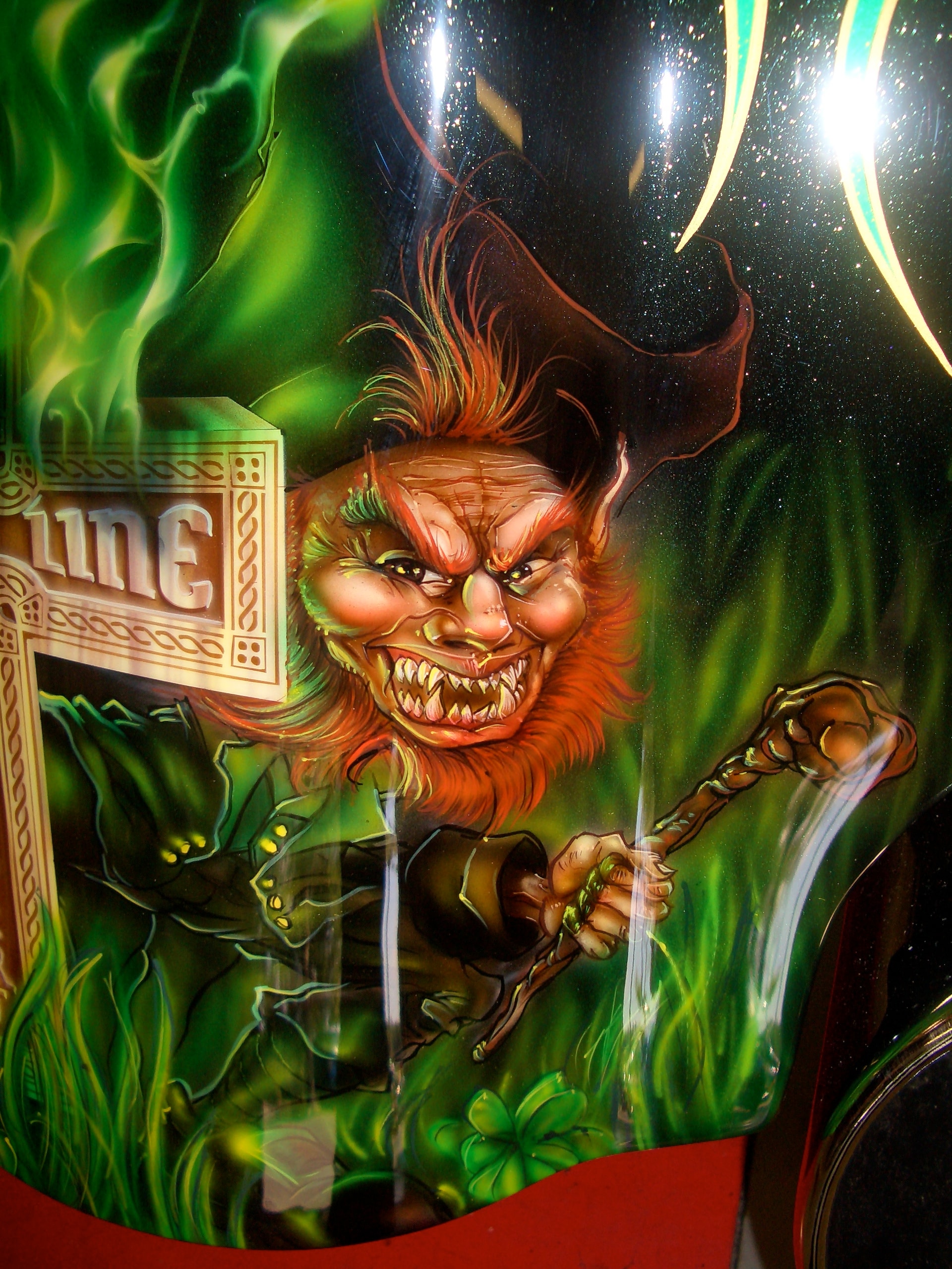 Irish Cadillac — tank leprechaun closeup, snarling face and shillelagh detail