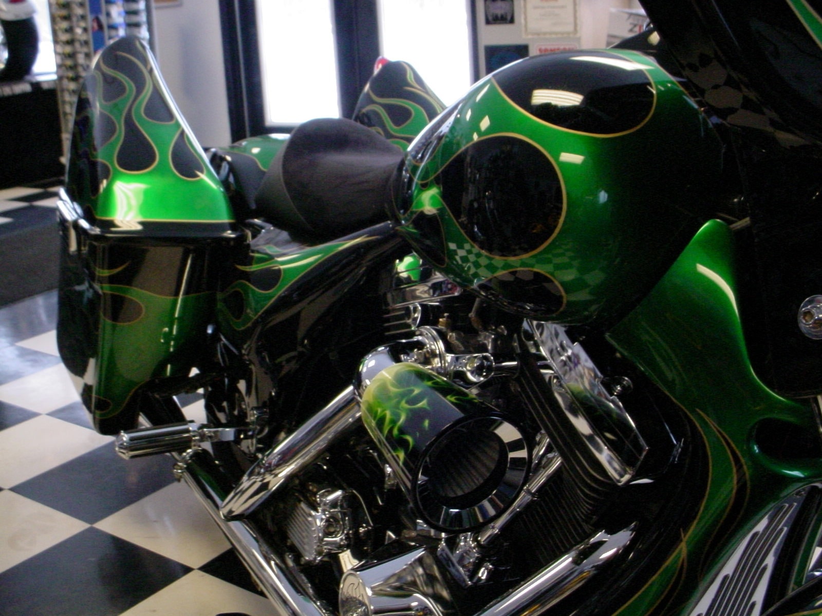 Irish Cadillac — engine and tank overhead, green flame graphics across chrome and paint