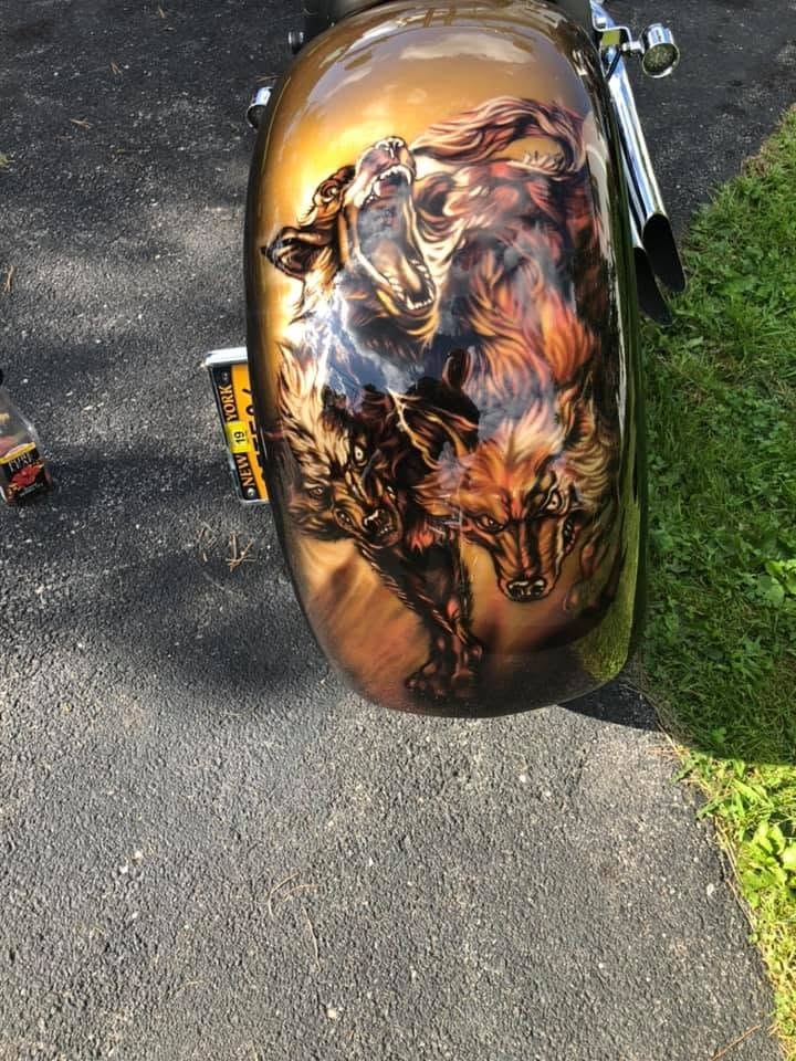 Ryan's Chopper — rear fender, Cerberus three-headed wolf guardian charging