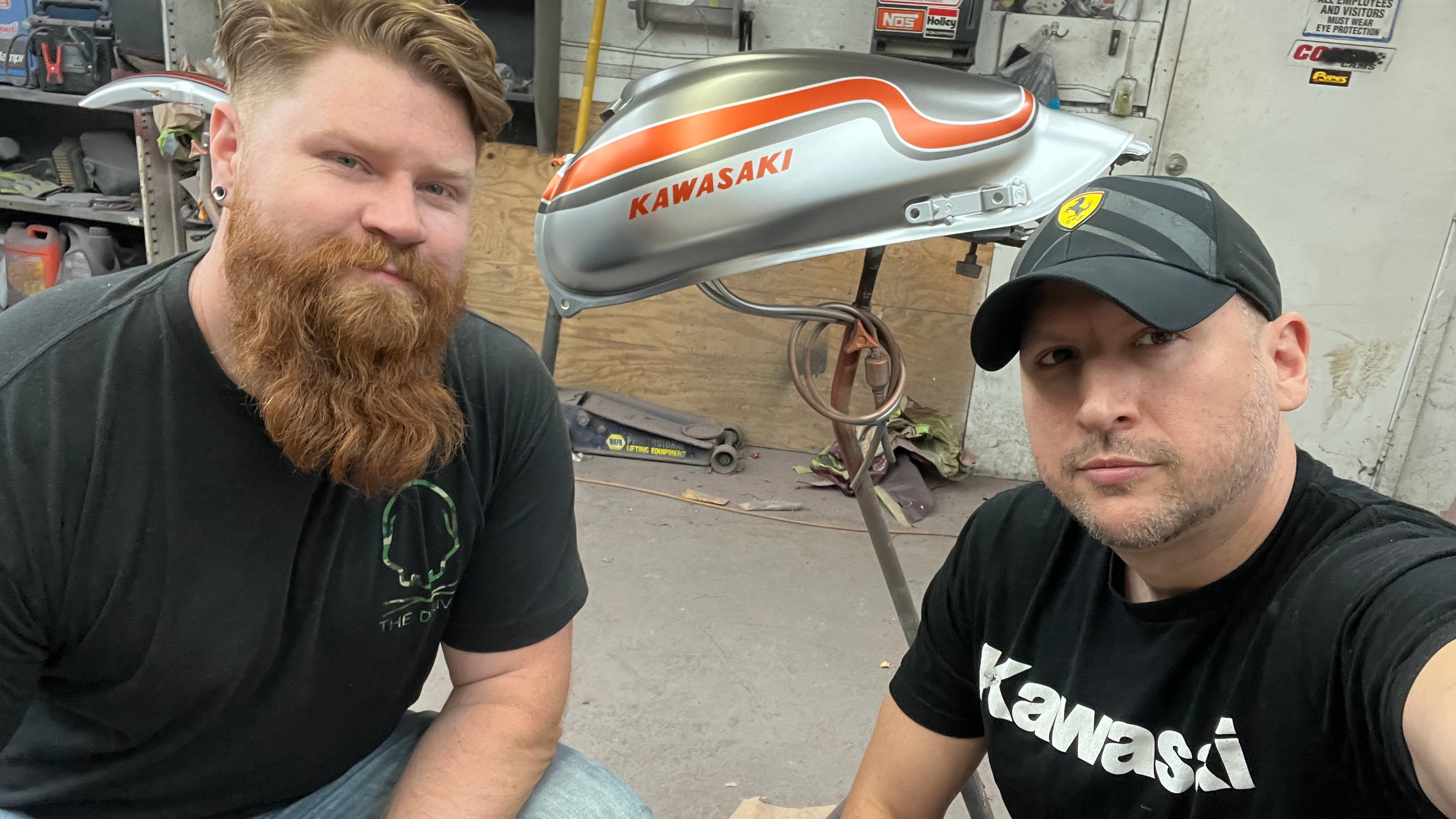 Kawasaki Vulcan S Cafe — Marcus Osmun and Jon Sawicki in the shop with the freshly painted tank