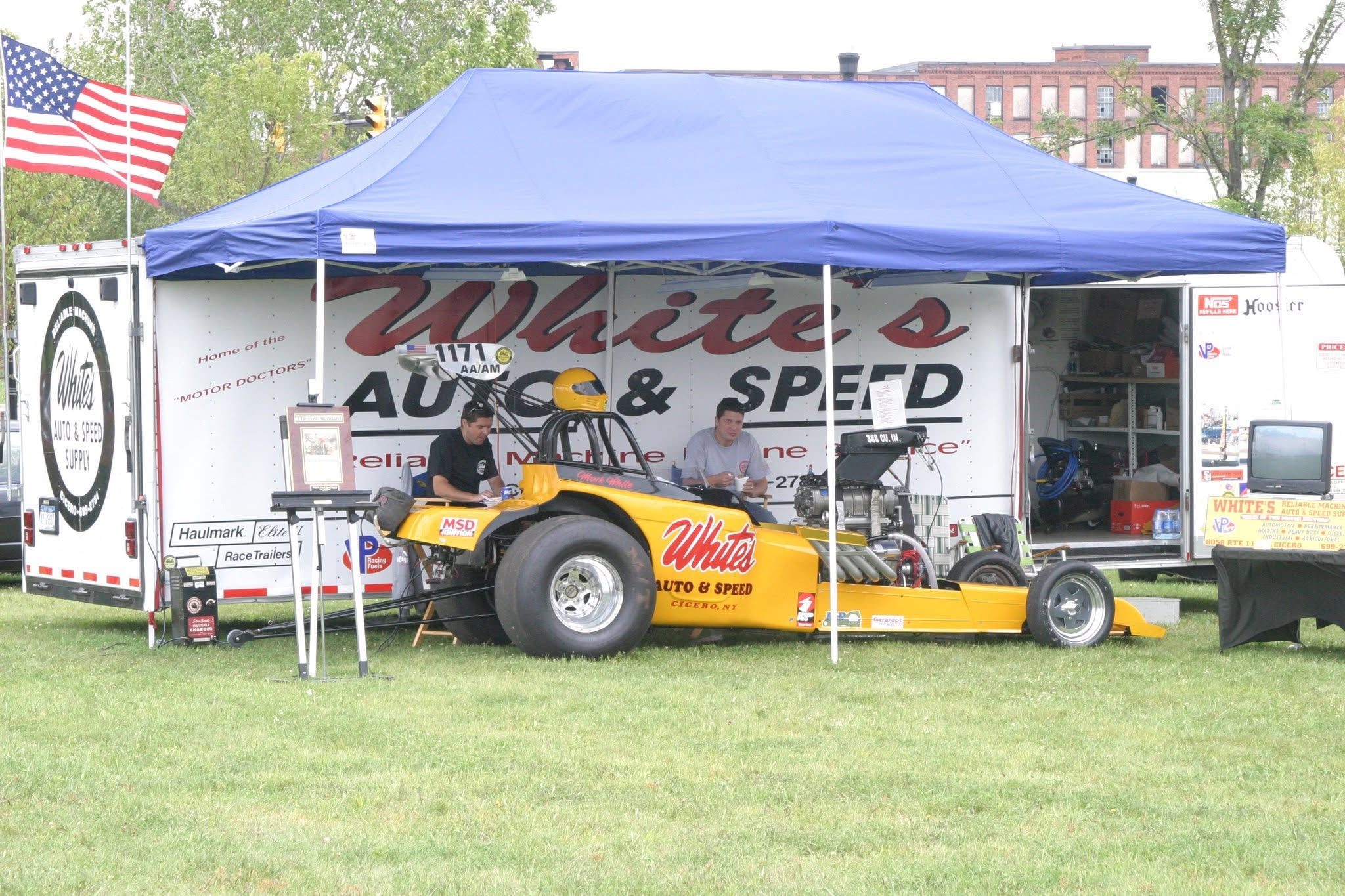 2006 Chick-N-Wing Festival — White's Auto & Speed drag car display under blue tent