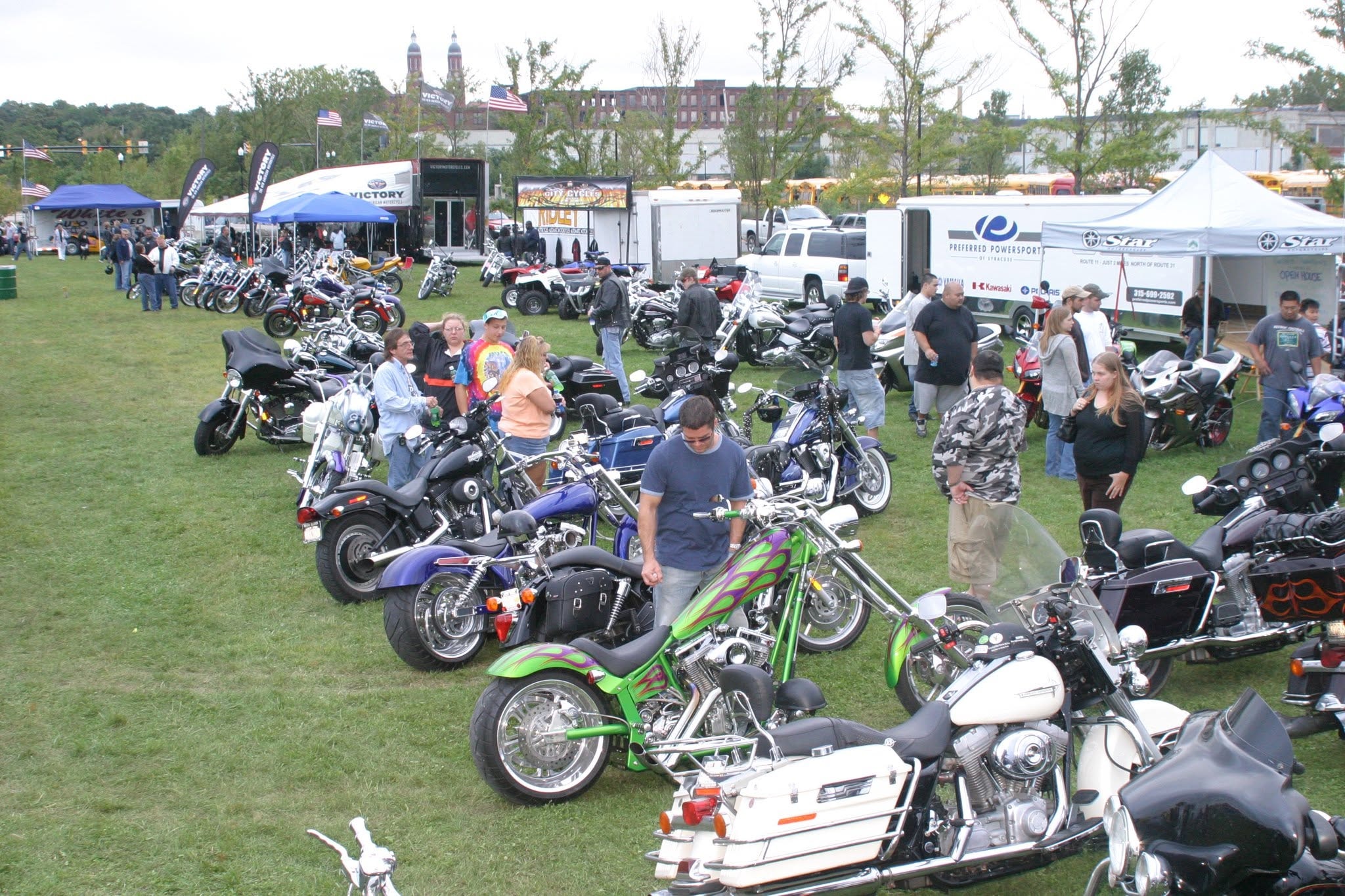 2006 Chick-N-Wing Festival — wide view of motorcycle show field with Victory, Ridley, and Preferred Powersports displays