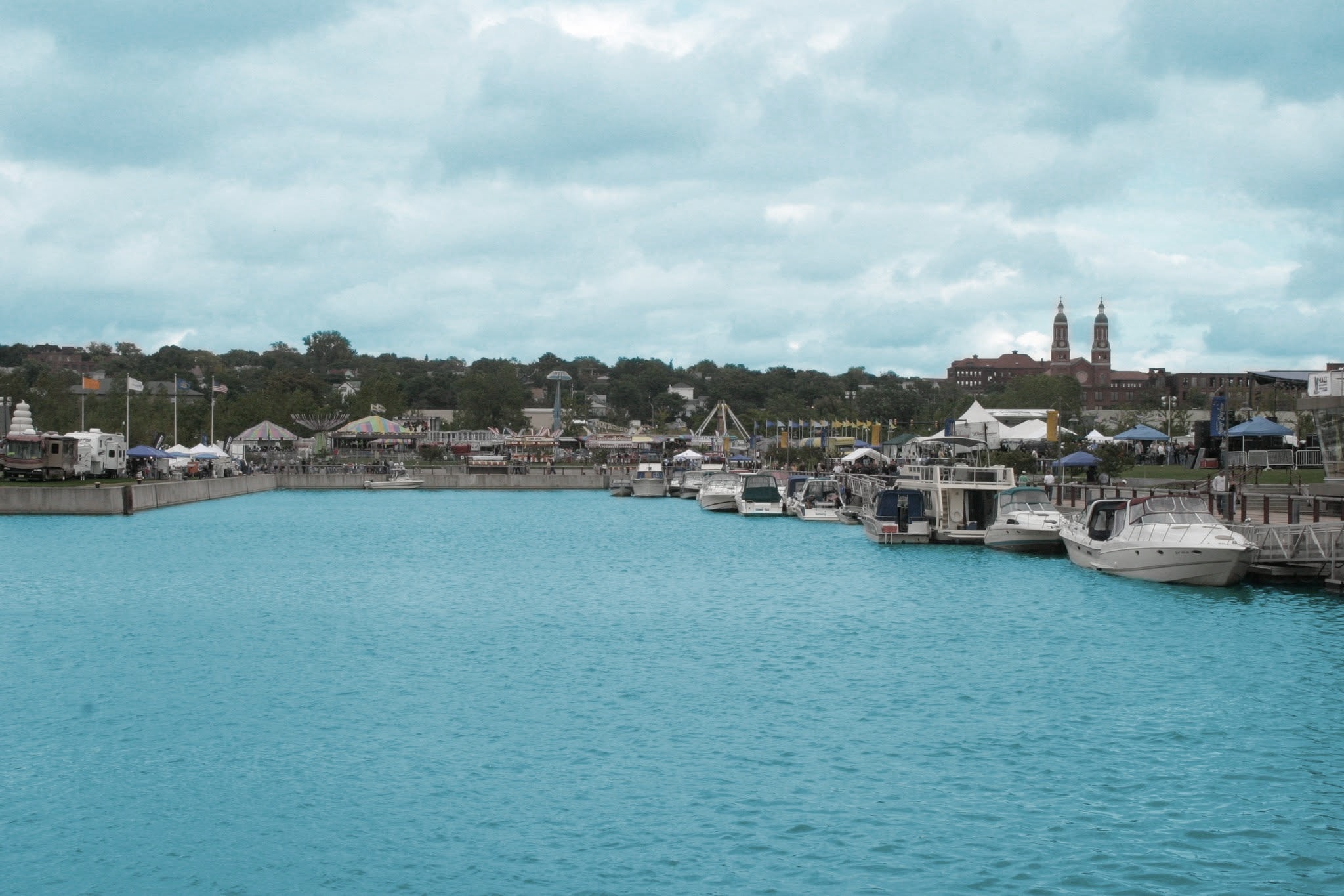 2006 Chick-N-Wing Festival — wide view of Inner Harbor marina with festival tents and carnival rides across the water
