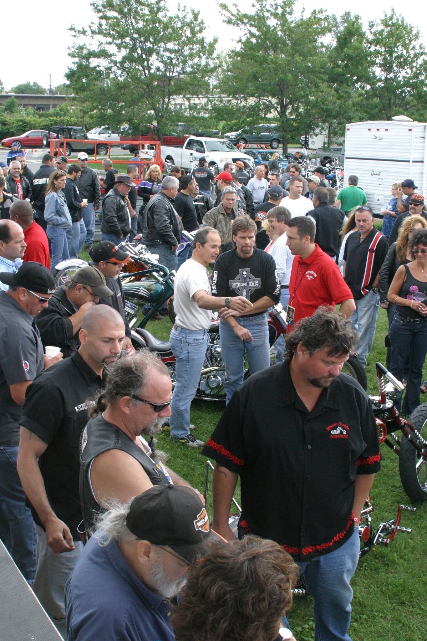 2006 Chick-N-Wing Festival — large crowd of motorcycle enthusiasts gathered on festival grounds with custom bikes