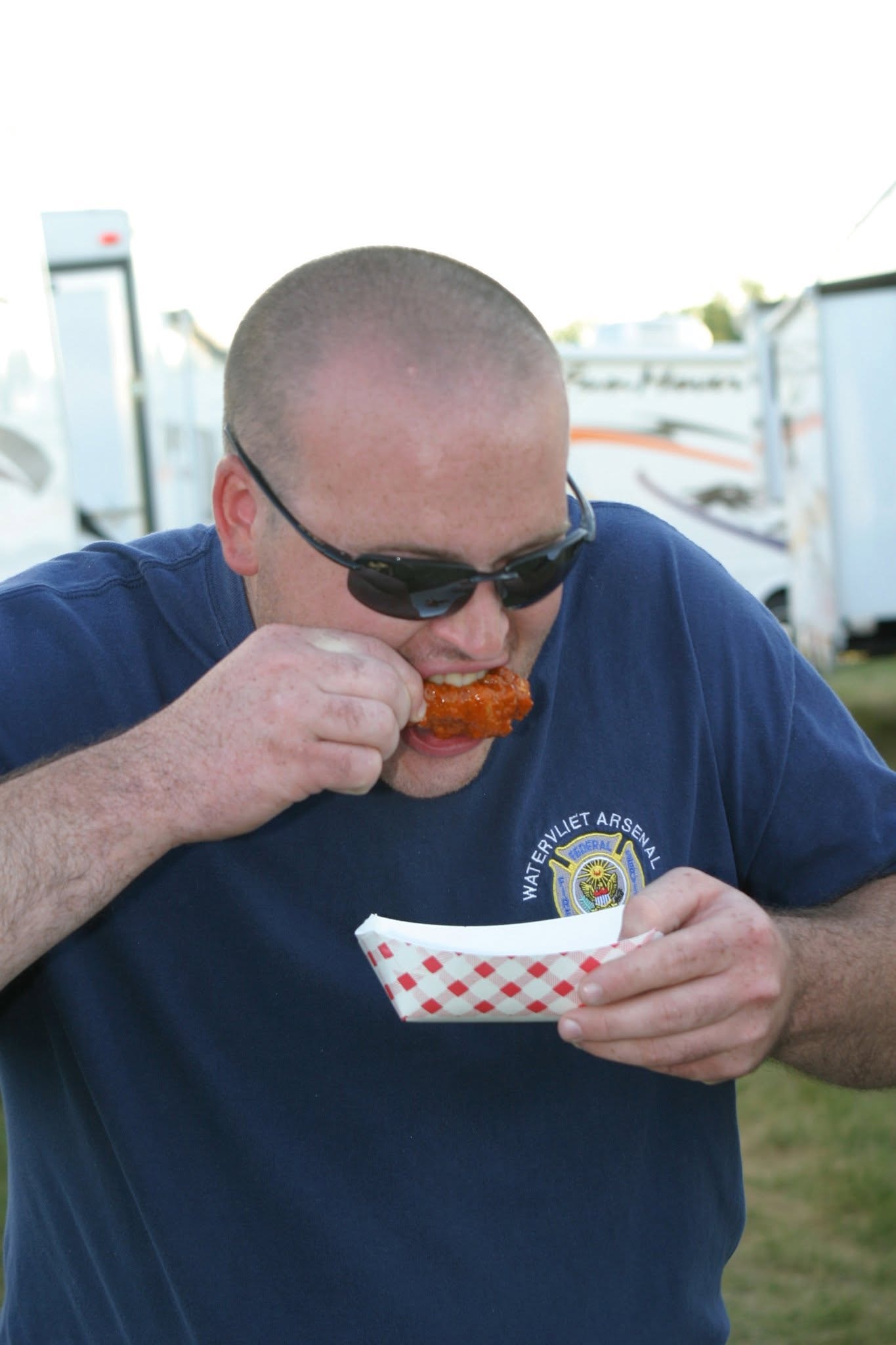 2006 Chick-N-Wing Festival — Watervliet Arsenal attendee eating a chicken wing at the festival