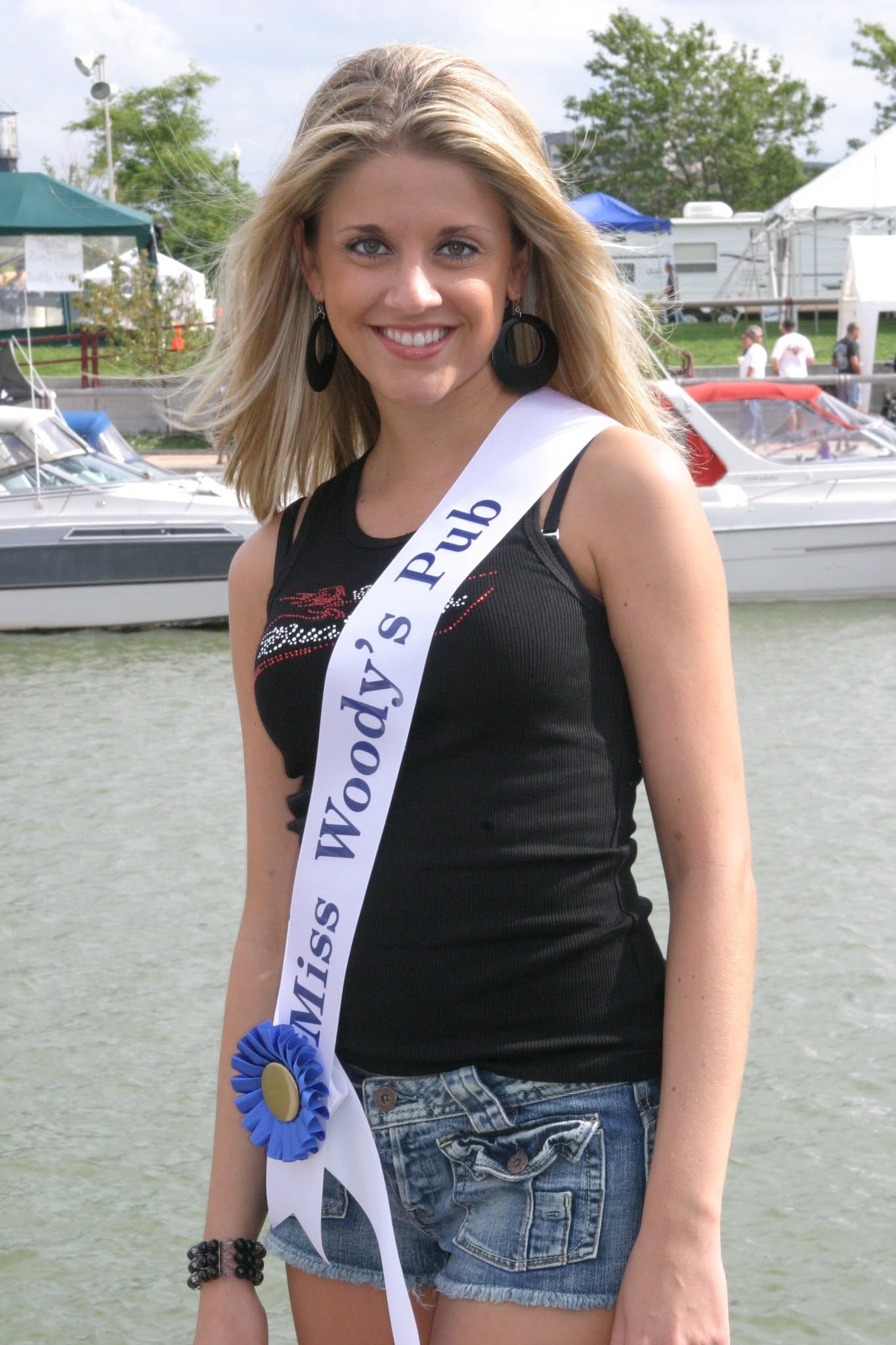 2006 Chick-N-Wing Festival — Miss Woody's Pub contestant with blue ribbon sash at Inner Harbor waterfront