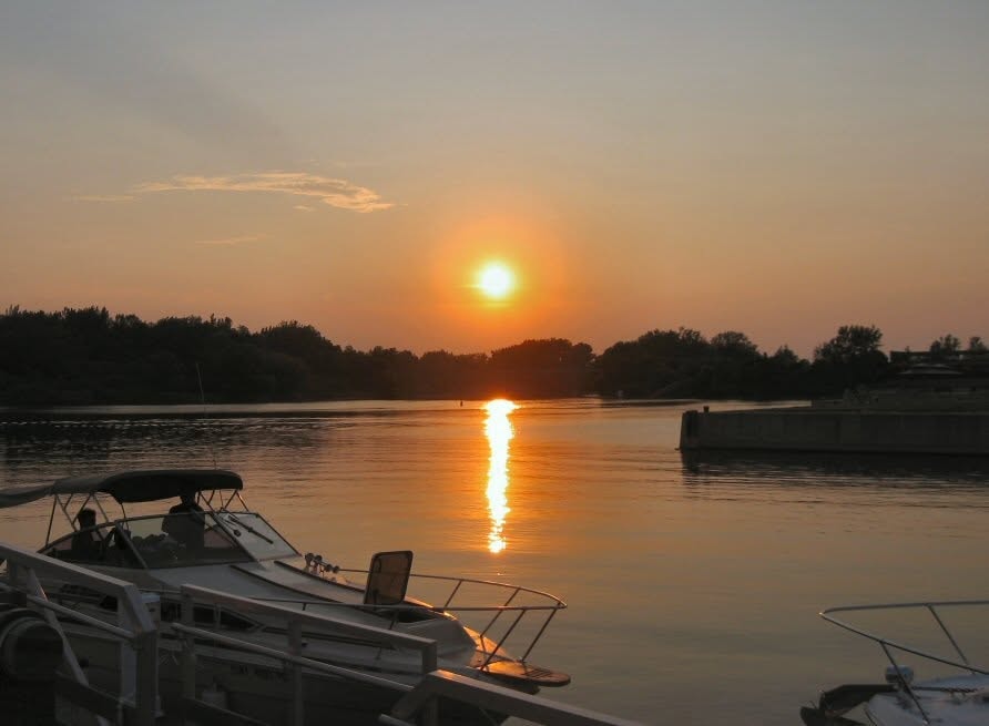 2006 Chick-N-Wing Festival — sunset over Inner Harbor marina with boats silhouetted on calm water