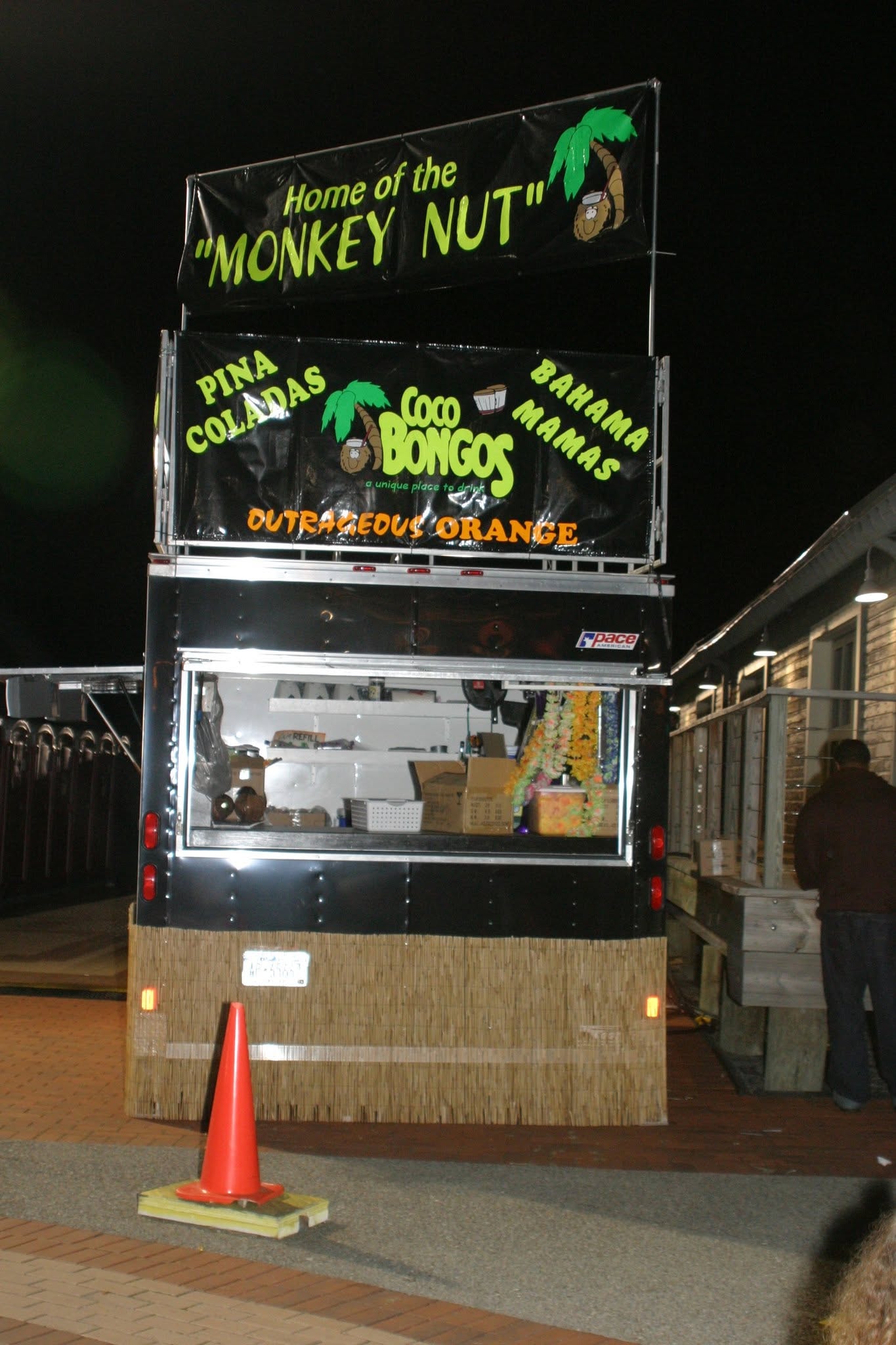 2006 Chick-N-Wing Festival — Coco Bongos Monkey Nut vendor trailer lit up at night at Inner Harbor