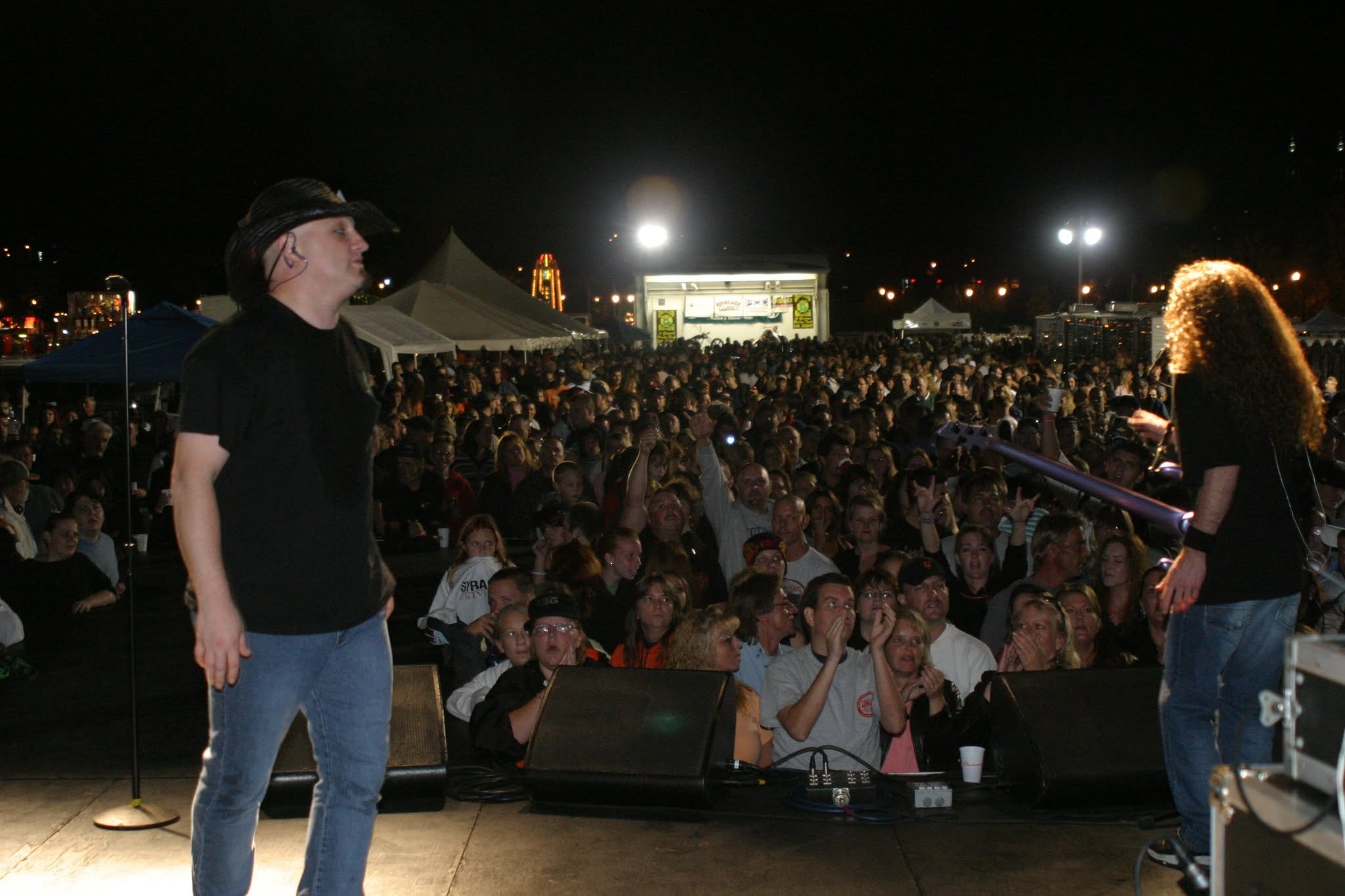 2006 Chick-N-Wing Festival — view from stage of massive night crowd at Inner Harbor with festival tents and lights in background