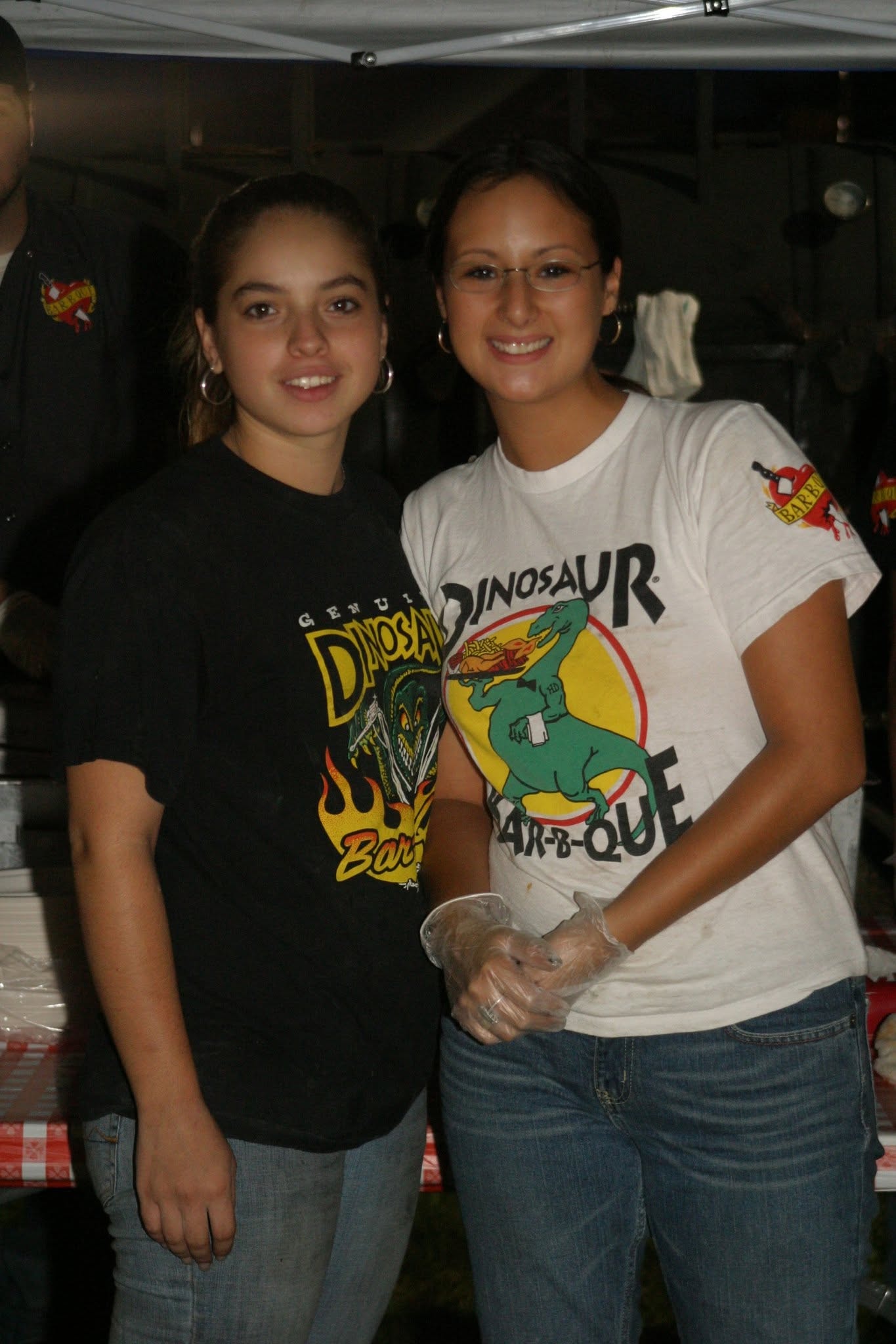 2008 Chick-N-Wing Festival — two Dinosaur Bar-B-Que staff members posing at vendor booth