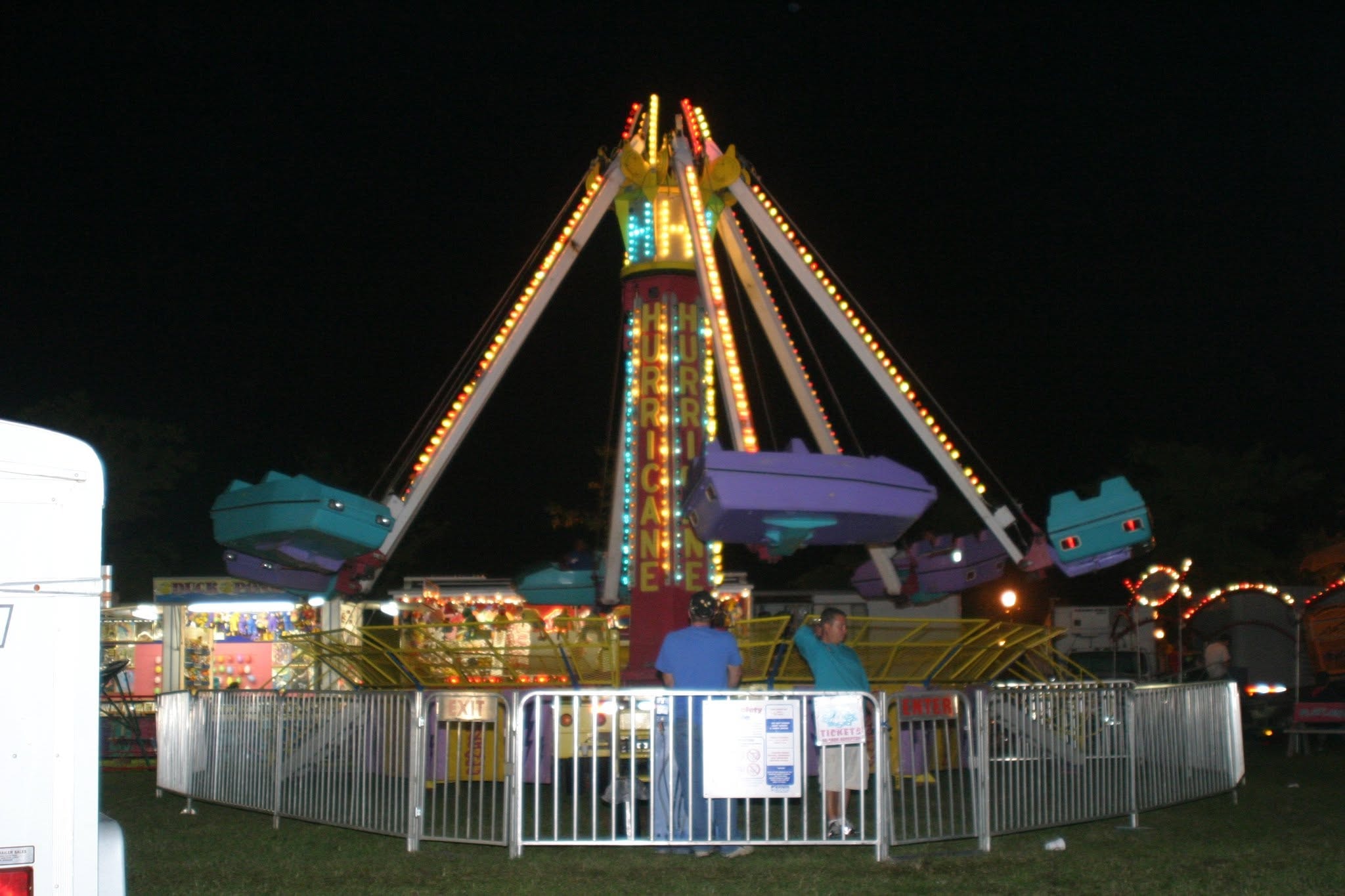 2008 Chick-N-Wing Festival — Hurricane carnival ride lit up at night