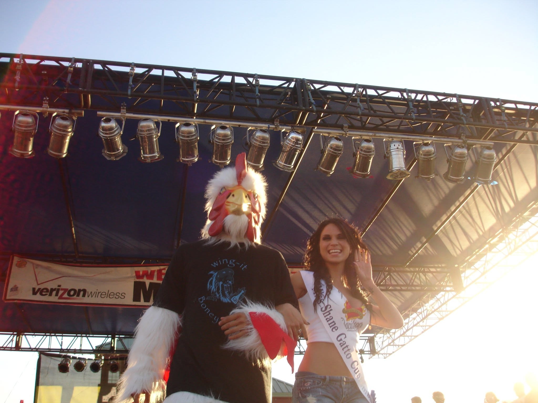 2008 Chick-N-Wing Festival — Wing-It mascot with festival queen on stage at Verizon Wireless stage