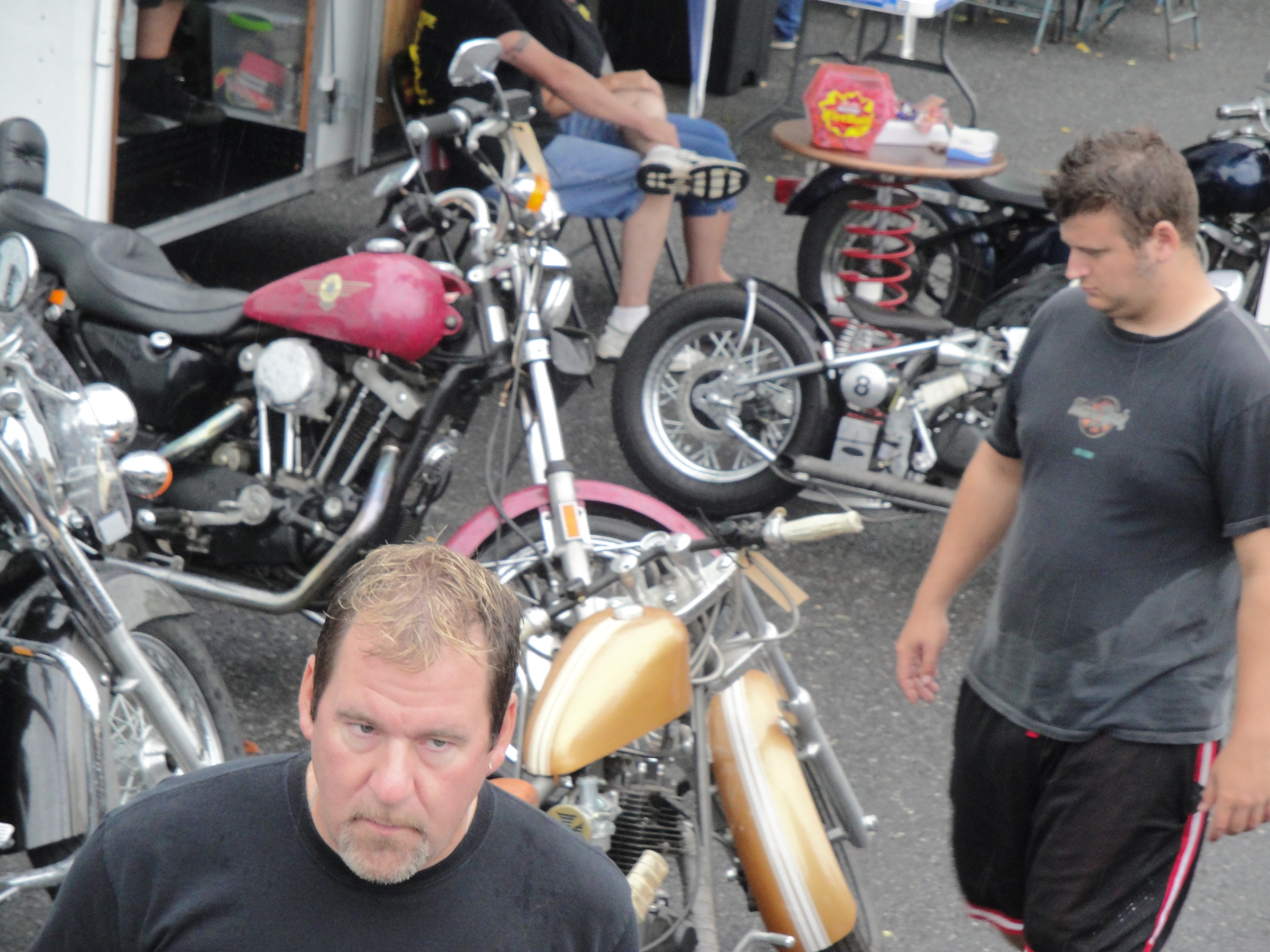 Higie's Iron Horse Saloon Summer BBQ Series — custom motorcycles on display in parking area