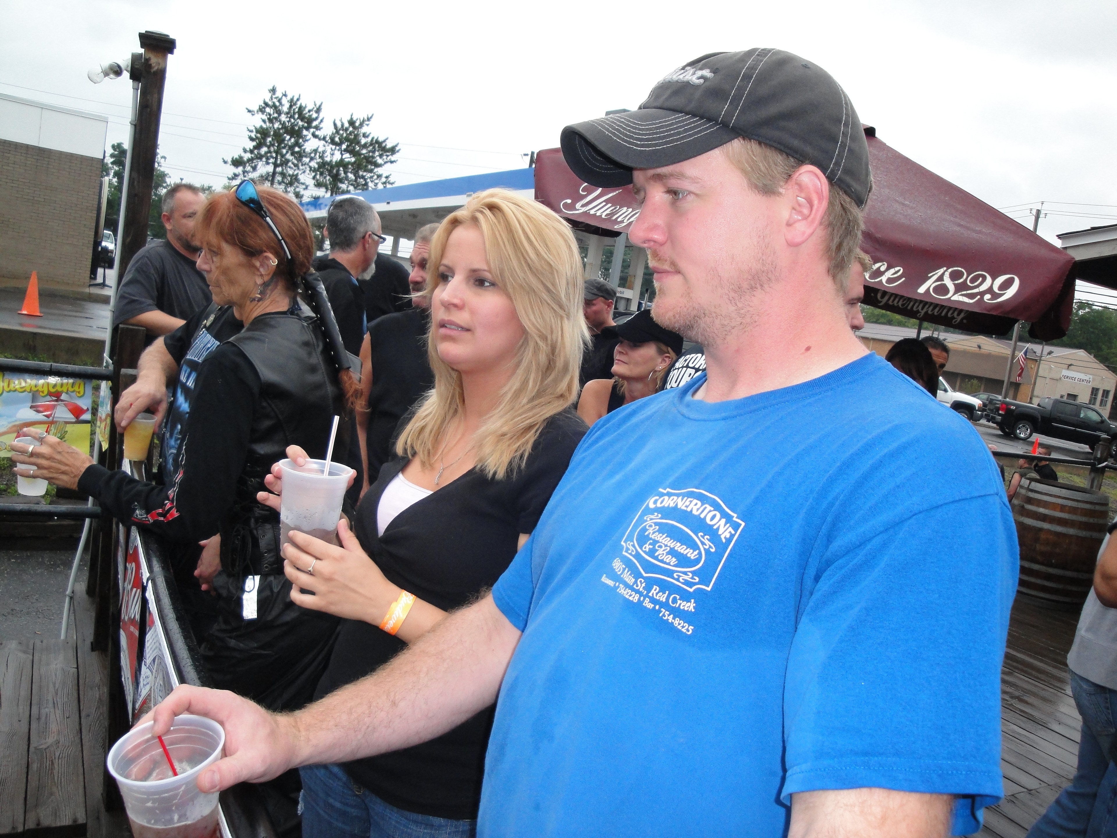 Higie's Iron Horse Saloon Summer BBQ Series — couple watching the event on outdoor deck