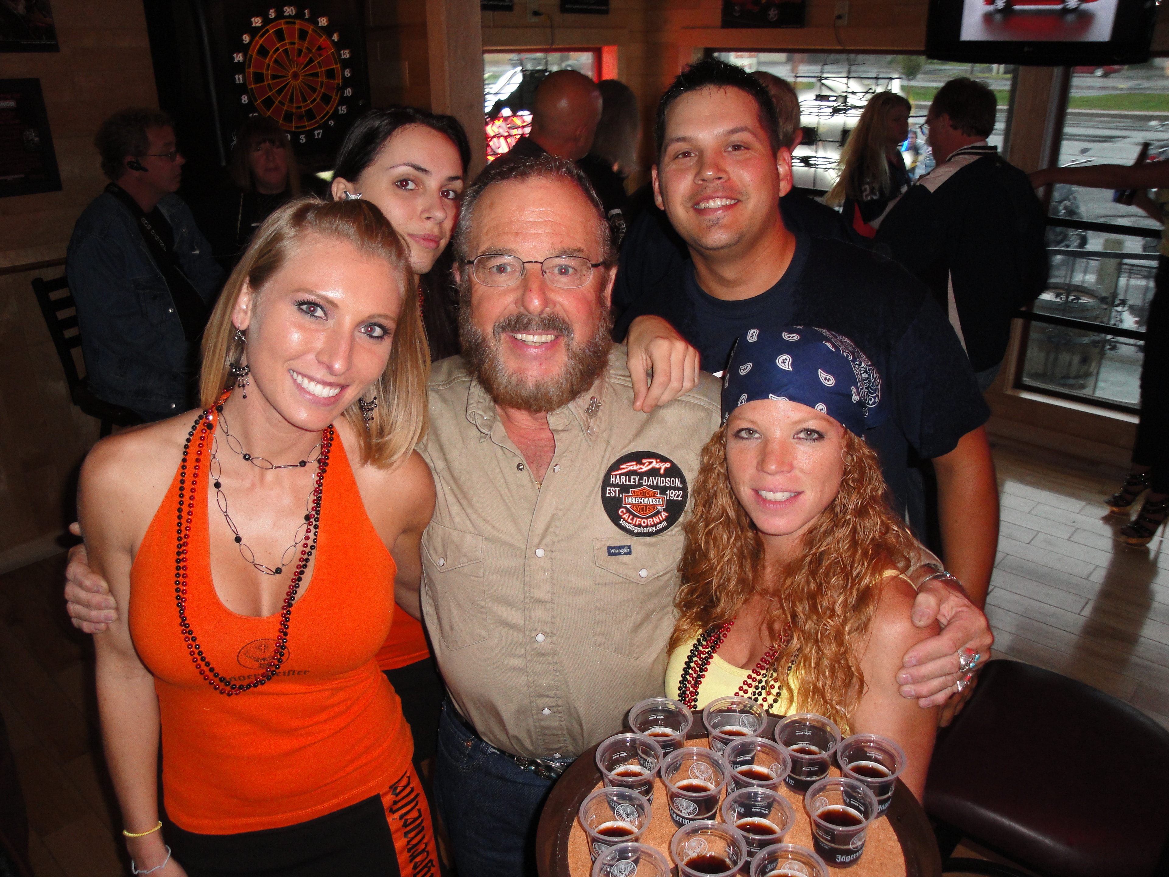 Higie's Iron Horse Saloon Summer BBQ Series — group of five posing inside the Iron Horse Saloon with Jagermeister shots tray