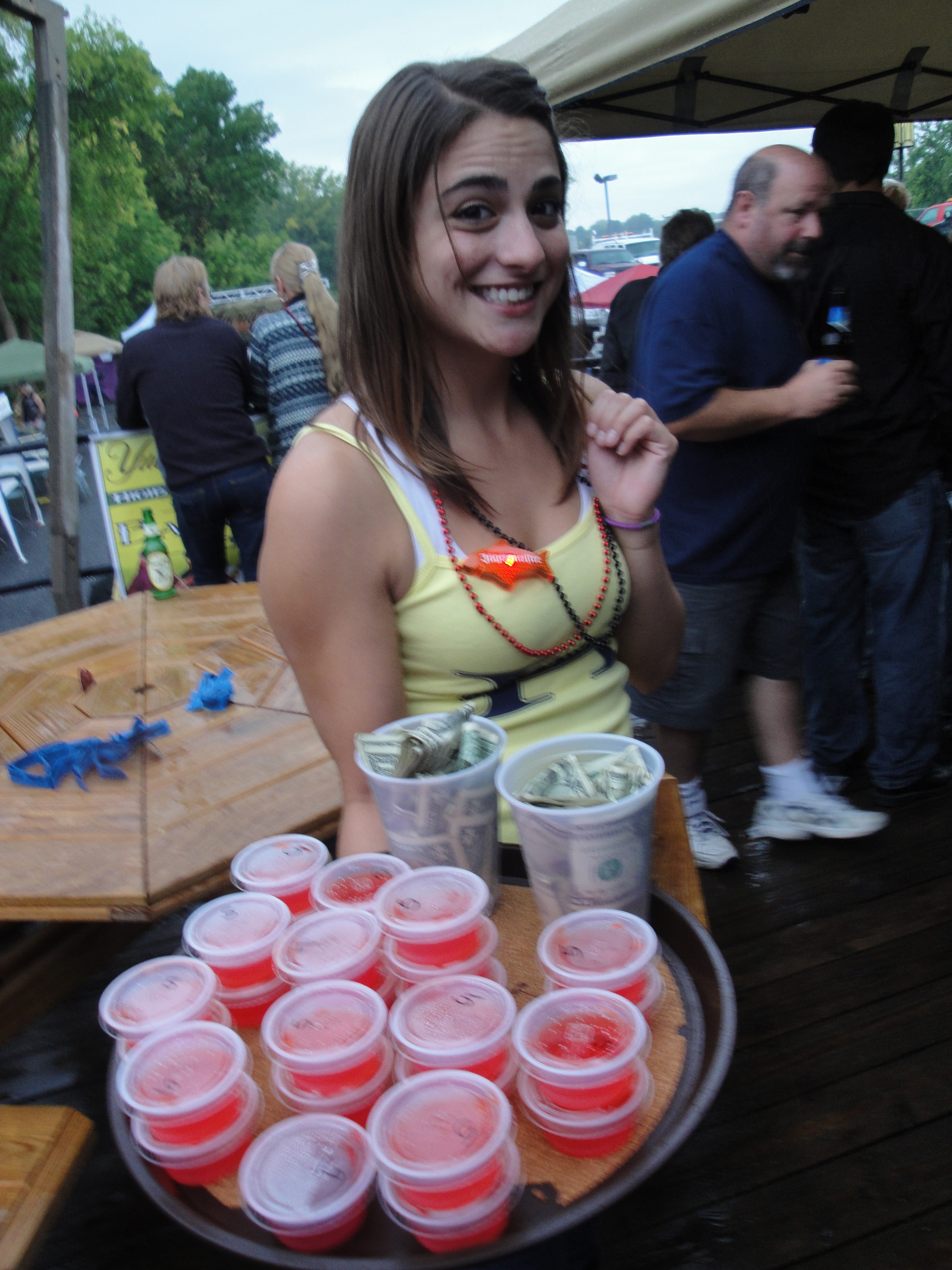 Higie's Iron Horse Saloon Summer BBQ Series — woman carrying tray of Jello shots at outdoor event