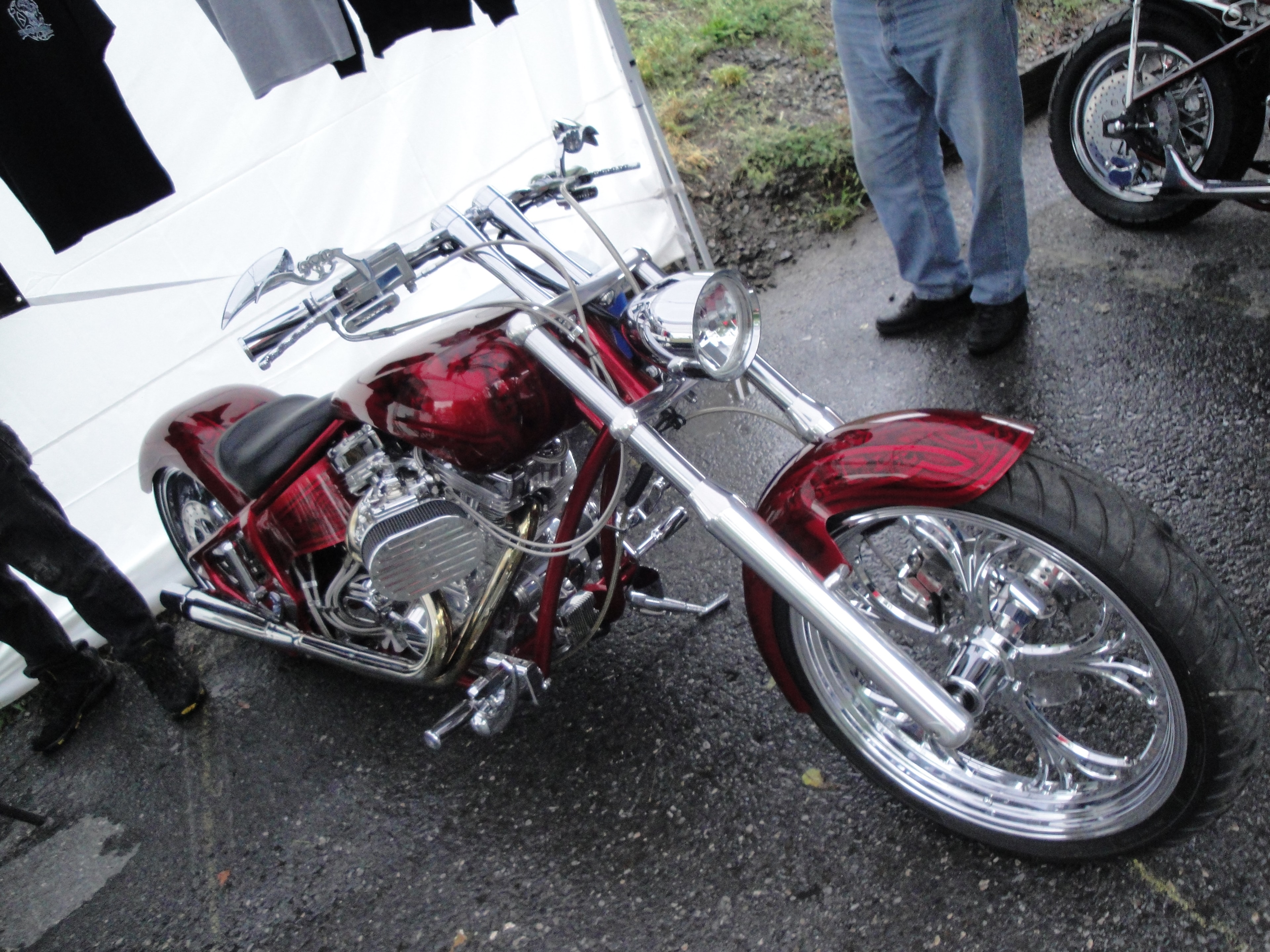 Higie's Iron Horse Saloon Summer BBQ Series — red and chrome custom chopper on display at the event