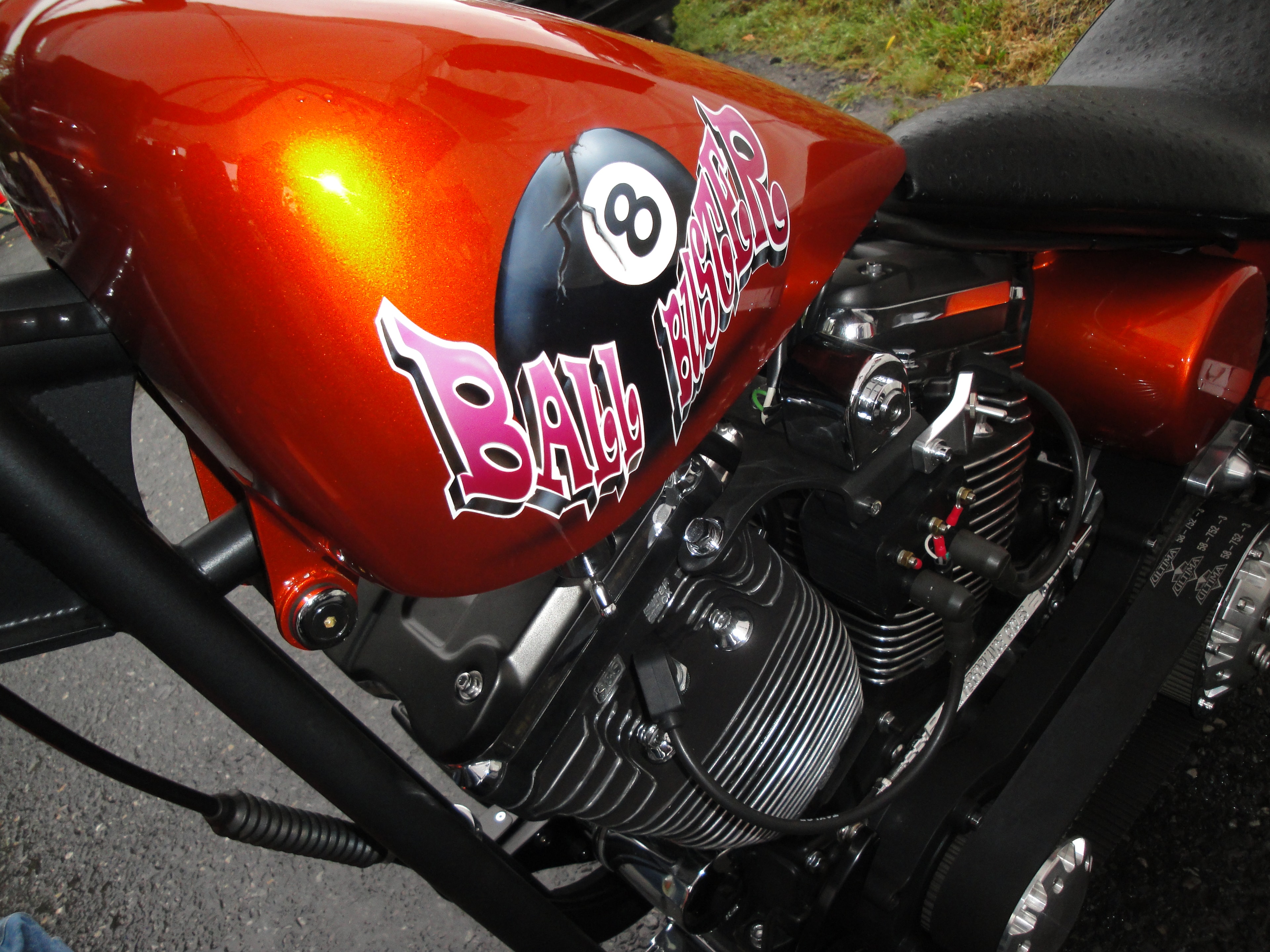 Higie's Iron Horse Saloon Summer BBQ Series — orange custom chopper tank with 8-ball Baller airbrushed art