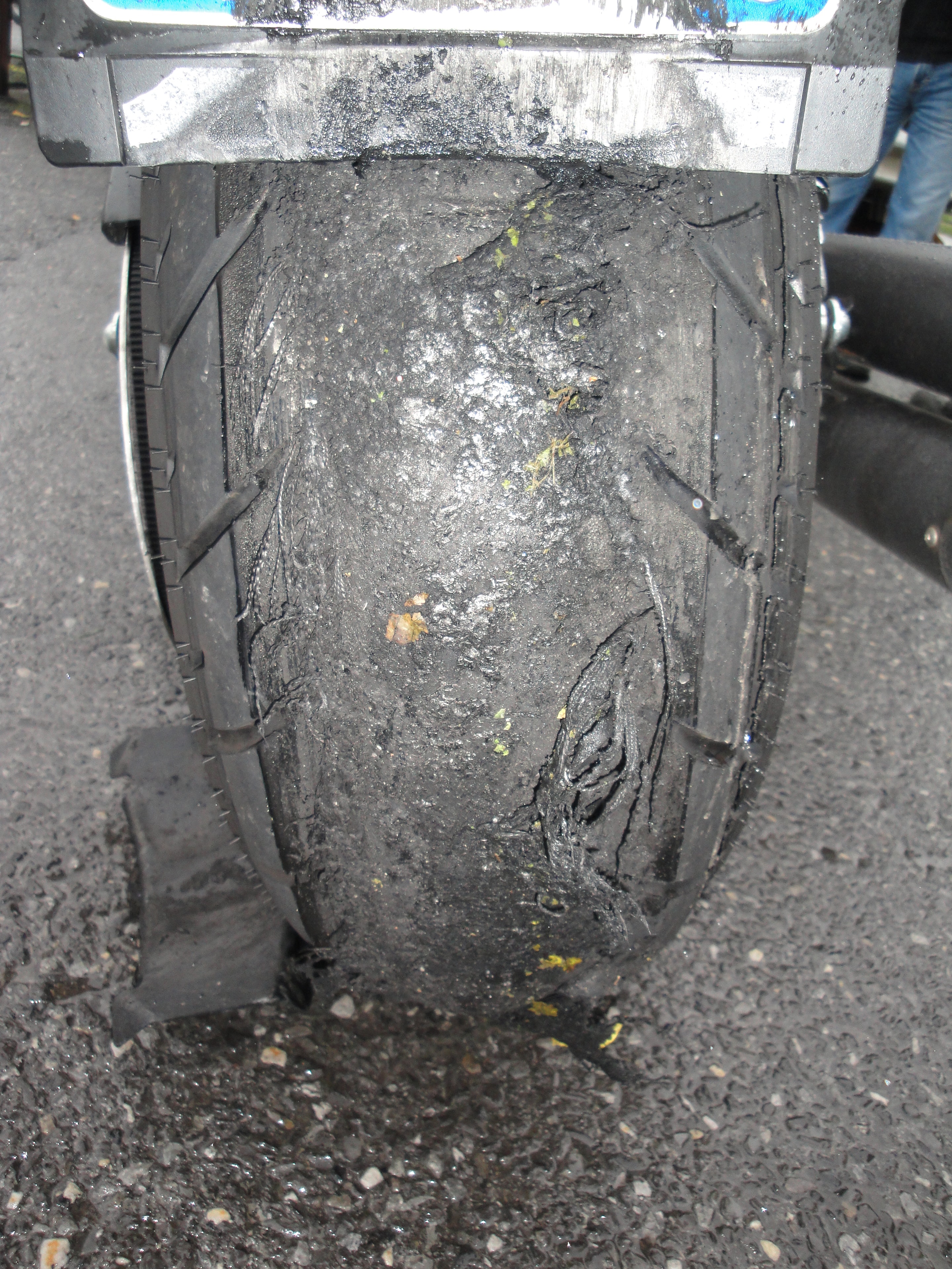 Higie's Iron Horse Saloon Summer BBQ Series — shredded rear motorcycle tire after burnout