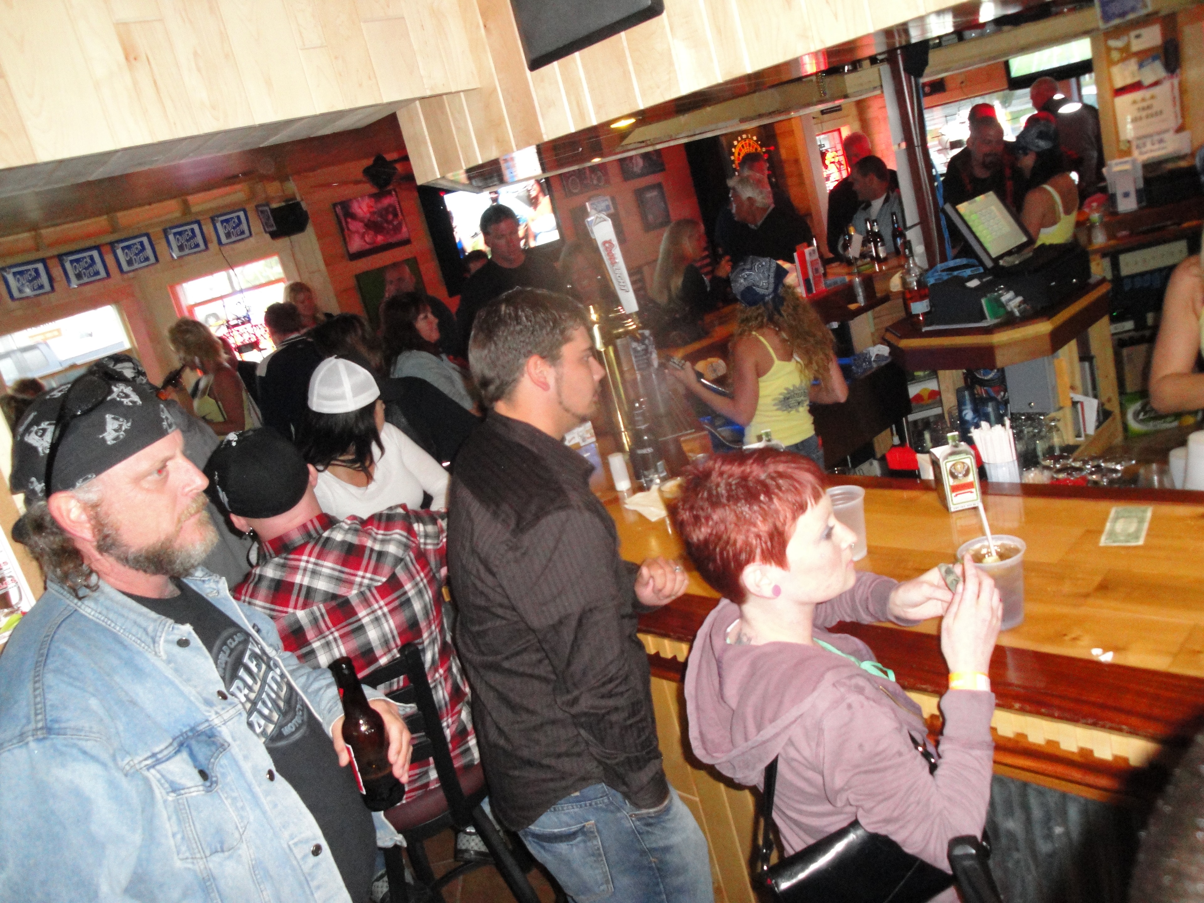 Higie's Iron Horse Saloon Summer BBQ Series — packed bar crowd at the Iron Horse Saloon with Jagermeister tap