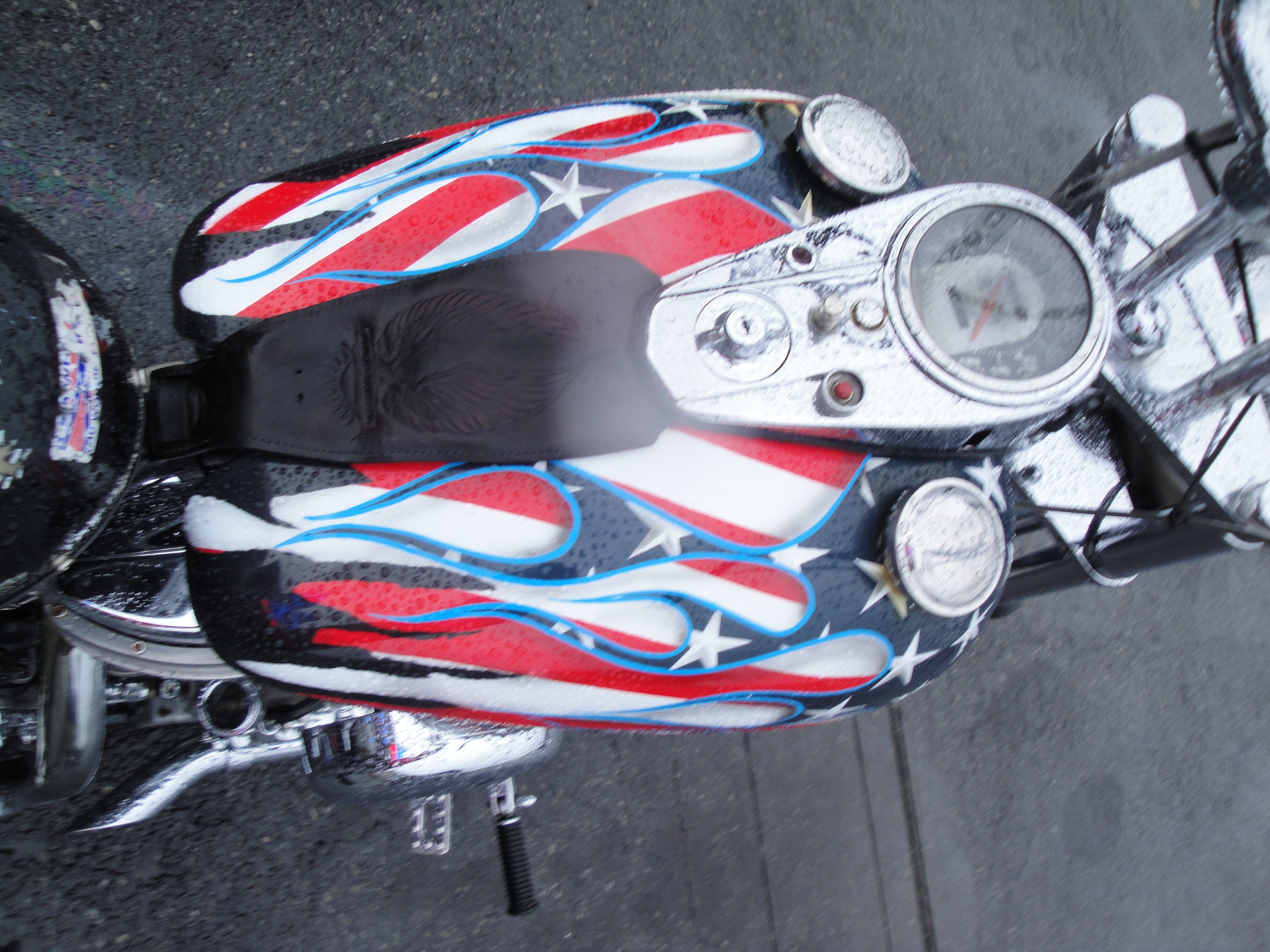 Higie's Iron Horse Saloon Summer BBQ Series — patriotic red white blue flame motorcycle tank overhead view