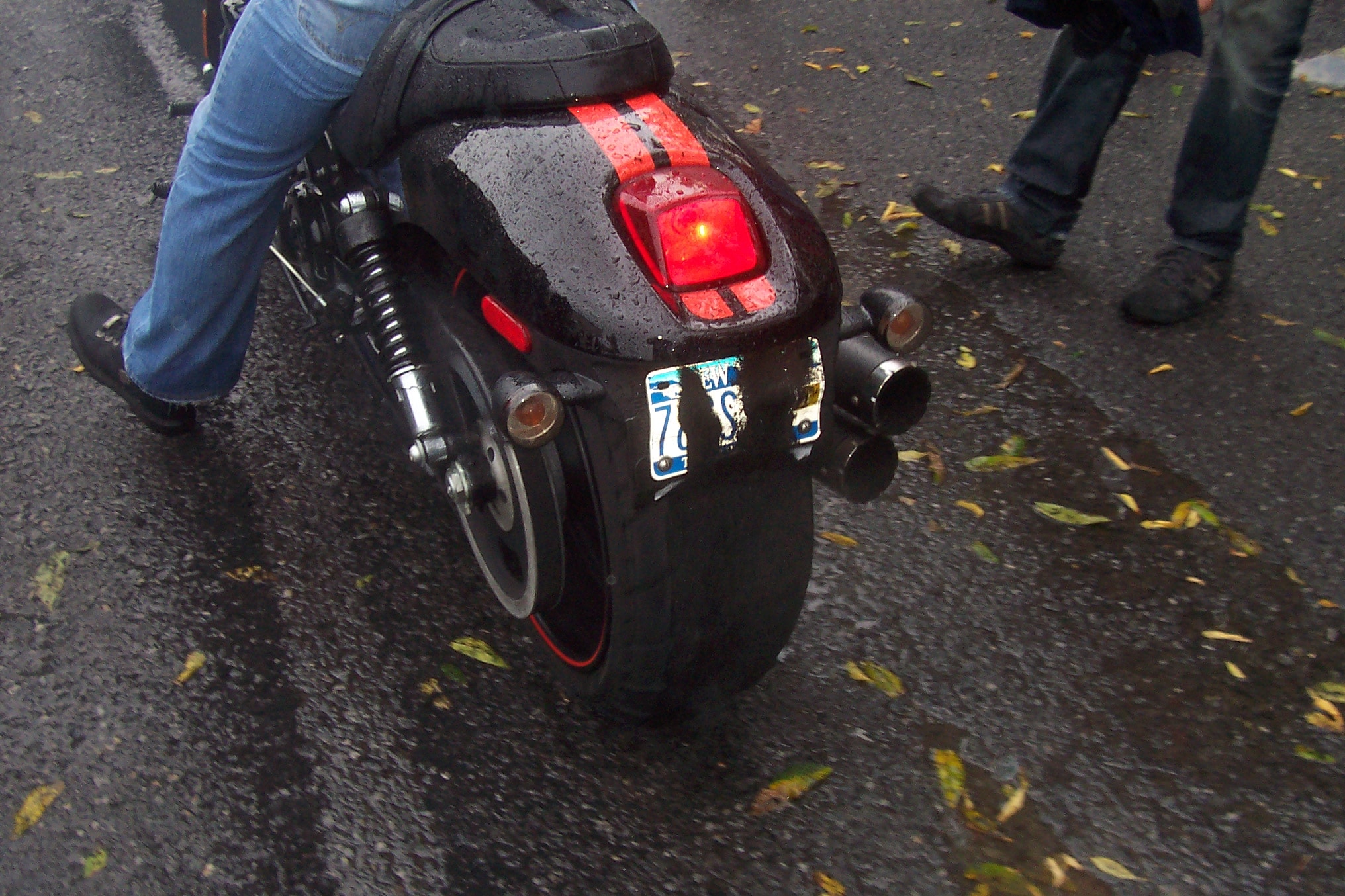 Higie's Iron Horse Saloon Summer BBQ Series — motorcycle rear wheel wet pavement