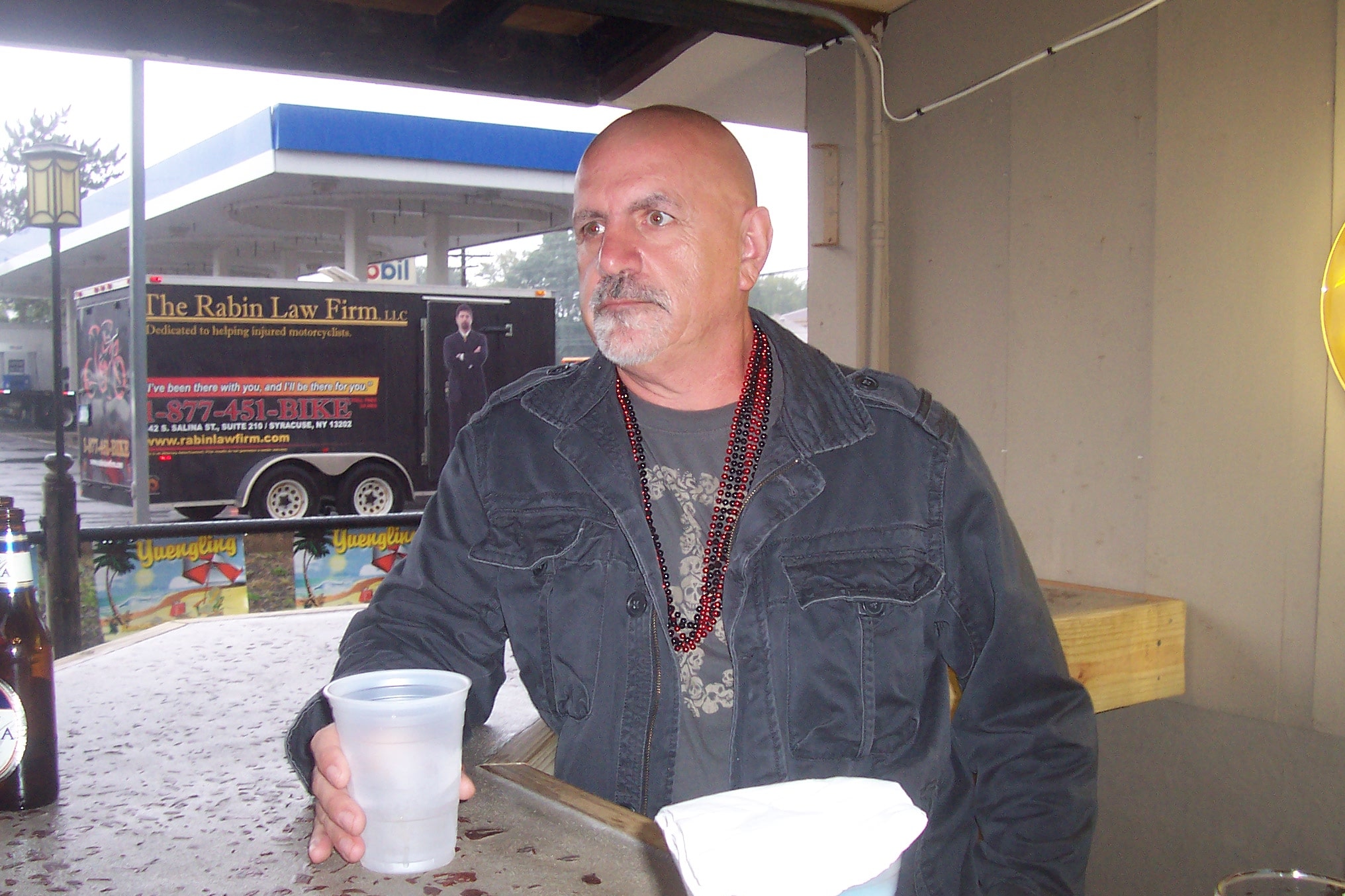 Higie's Iron Horse Saloon Summer BBQ Series — man at outdoor bar