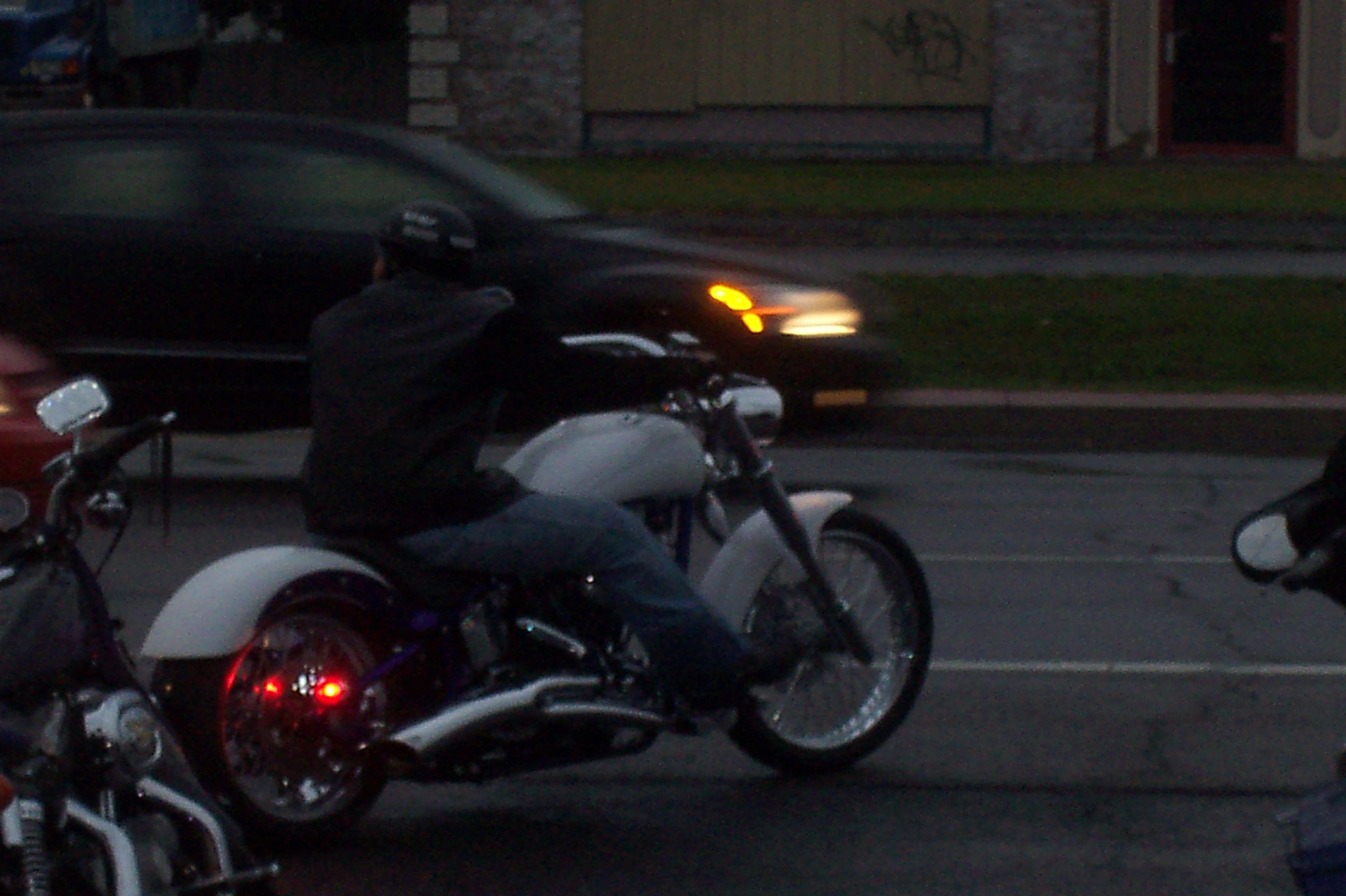 Higie's Iron Horse Saloon Summer BBQ Series — motorcycle riding at dusk