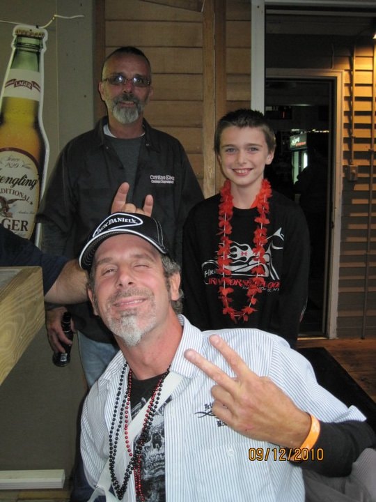 Higie's Iron Horse Saloon Summer BBQ Series — three people posing inside the saloon