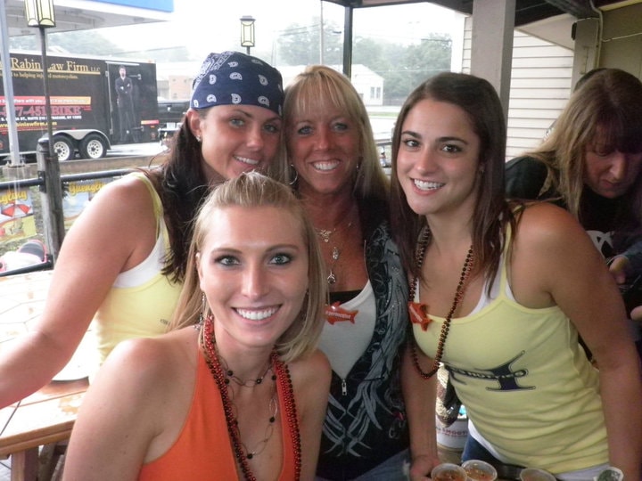Higie's Iron Horse Saloon Summer BBQ Series — four women posing outside the saloon