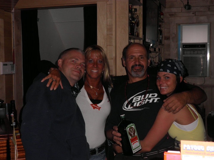 Higie's Iron Horse Saloon Summer BBQ Series — group of four posing inside the saloon