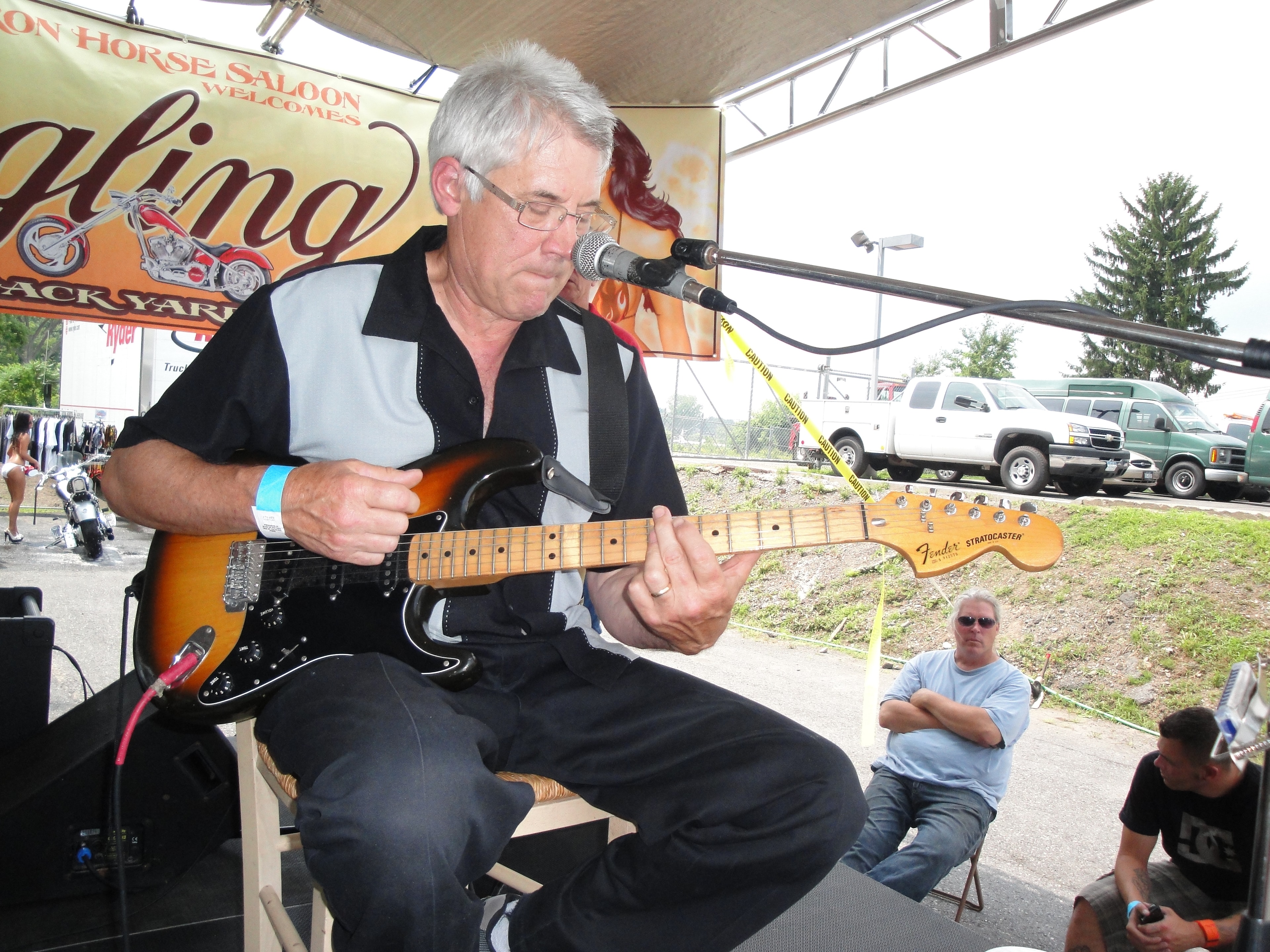 Higie's Iron Horse Saloon Summer BBQ Series — guitarist on stage with Fender Stratocaster