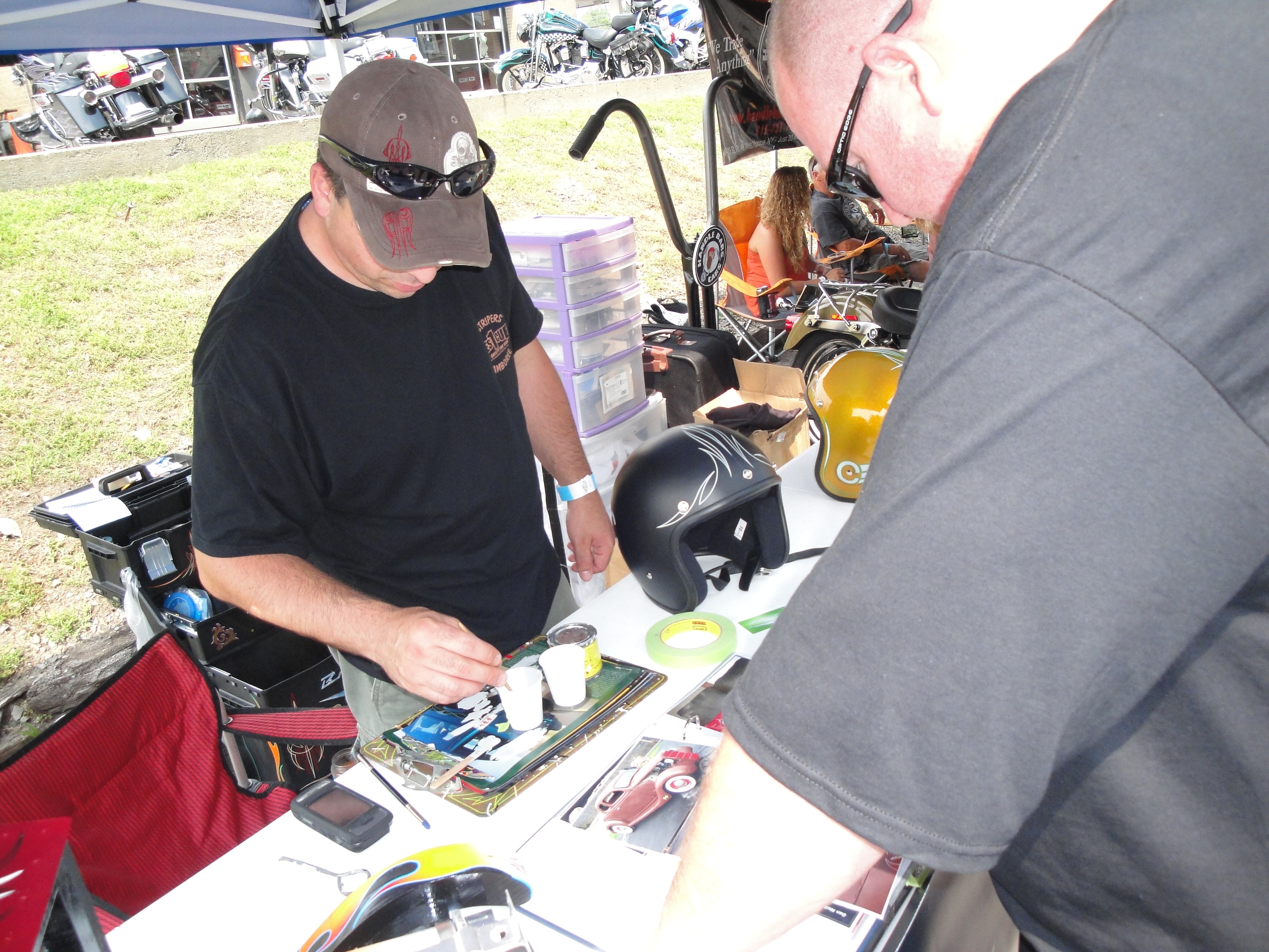 Higie's Iron Horse Saloon Summer BBQ Series — airbrush artist at vendor booth