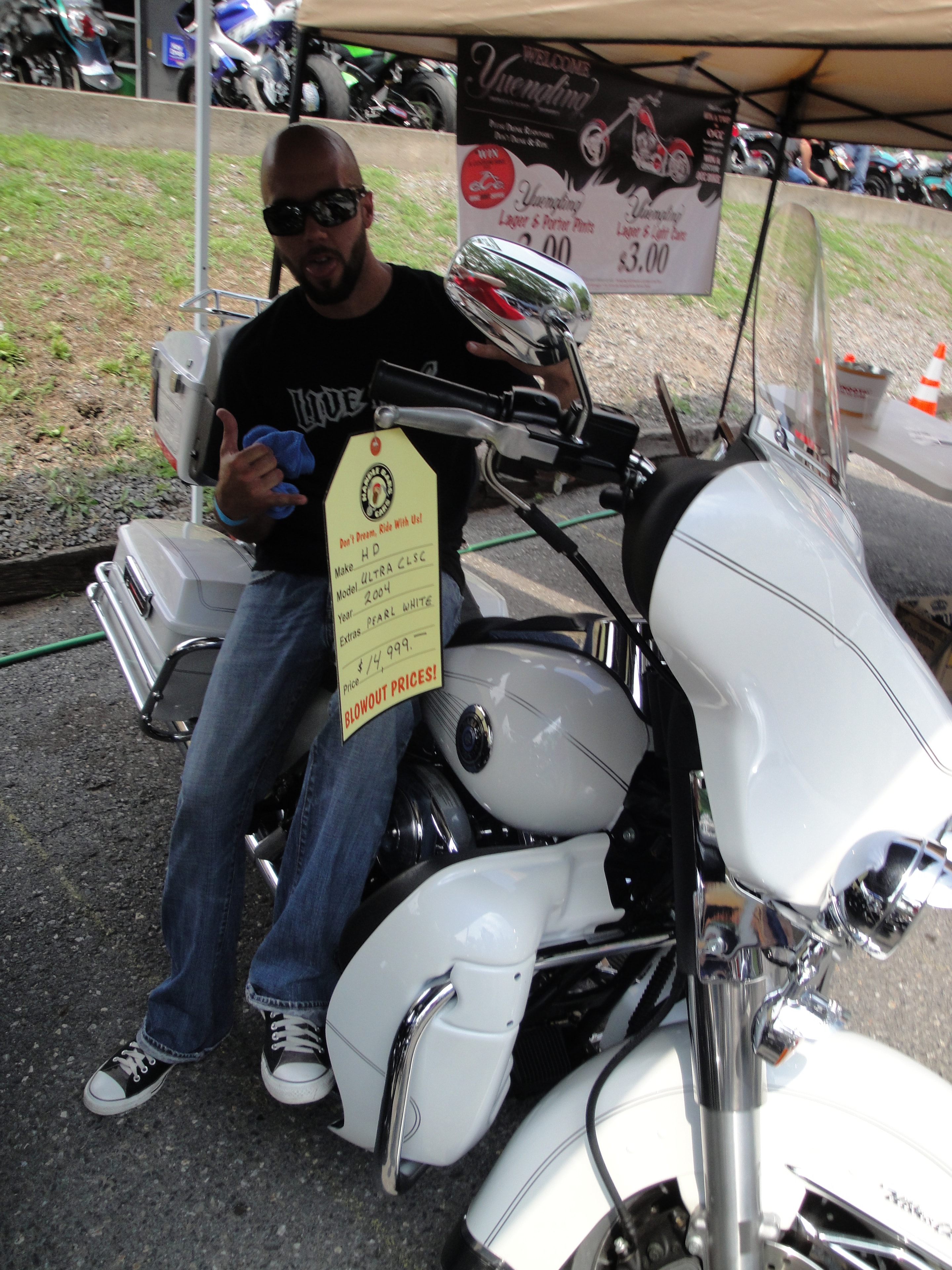 Higie's Iron Horse Saloon Summer BBQ Series — man with white HD Ultra Classic for sale