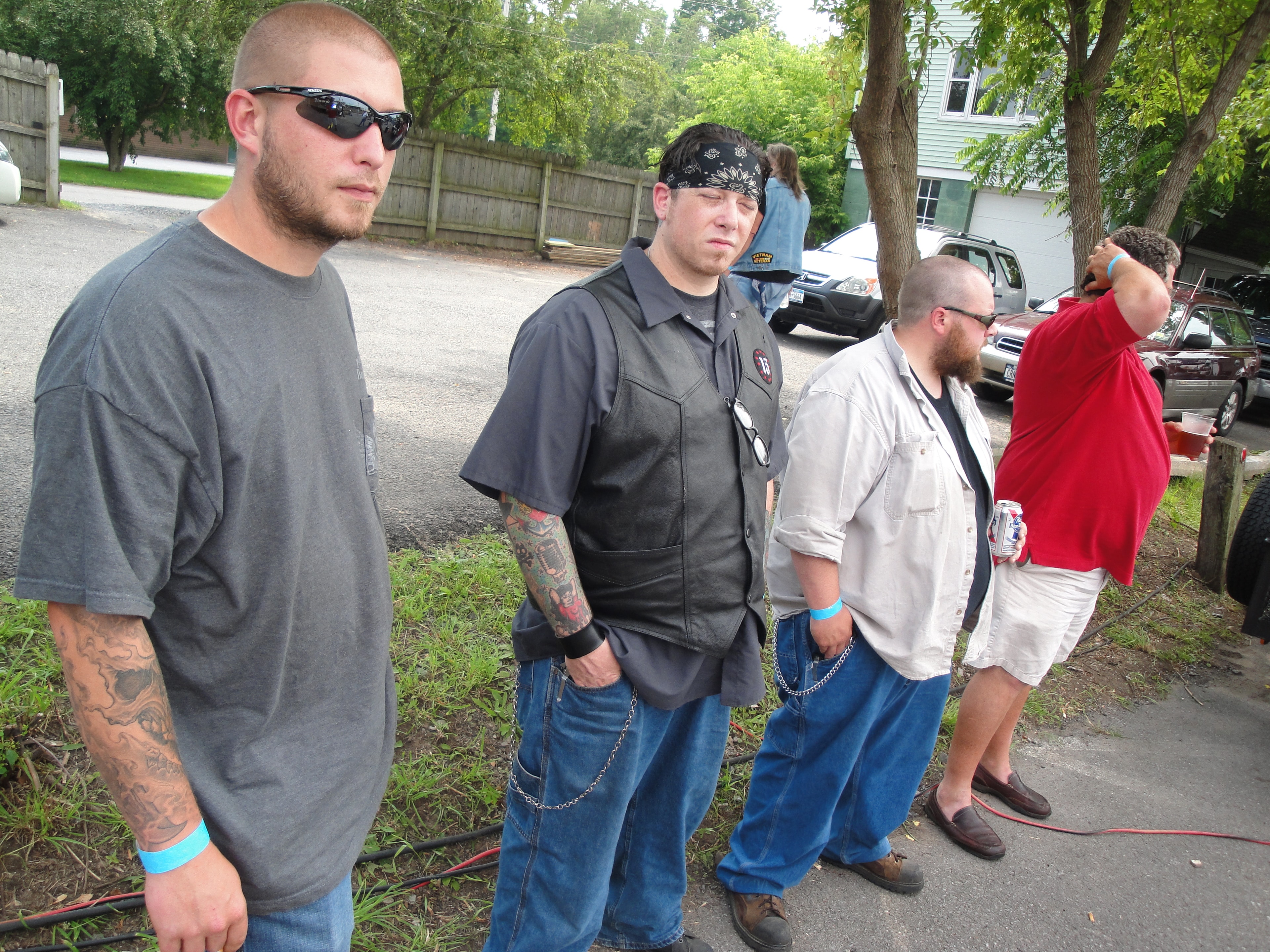 Higie's Iron Horse Saloon Summer BBQ Series — group of guys hanging out in the parking lot