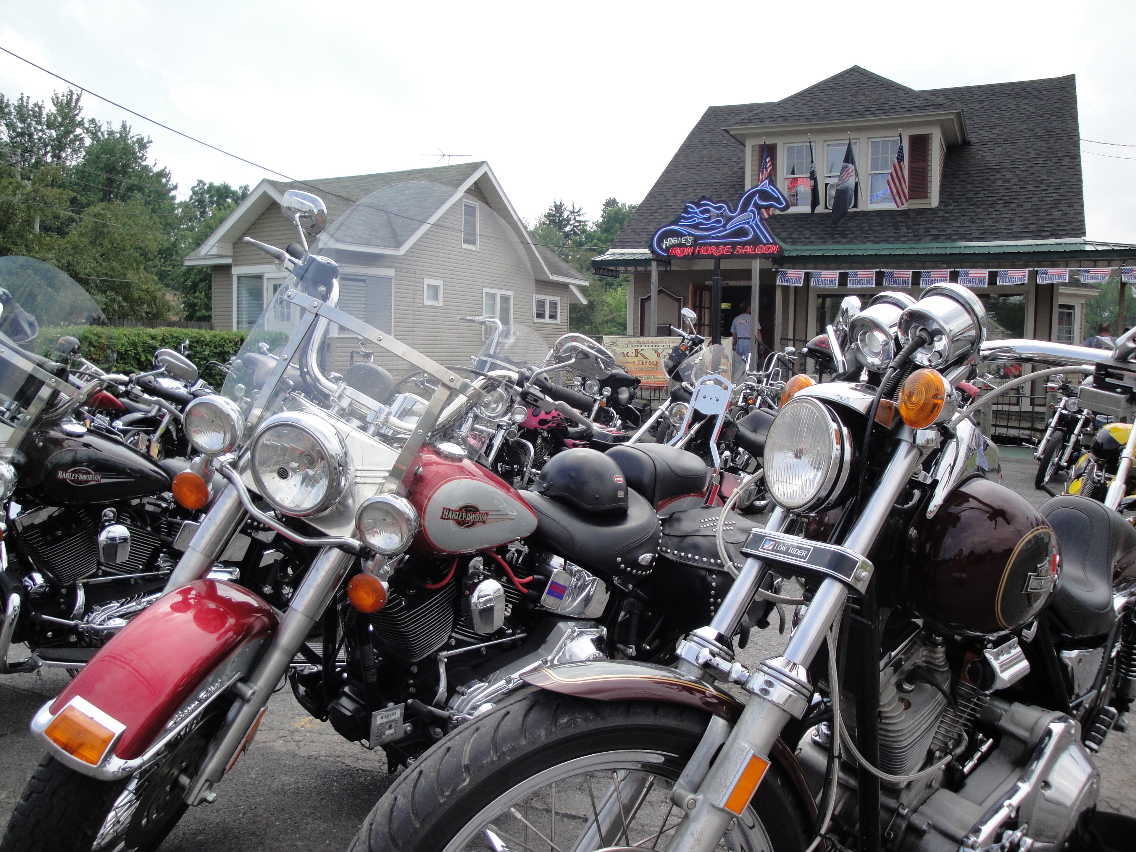 Higie's Iron Horse Saloon Summer BBQ Series — Higie's Iron Horse Saloon neon sign with bikes
