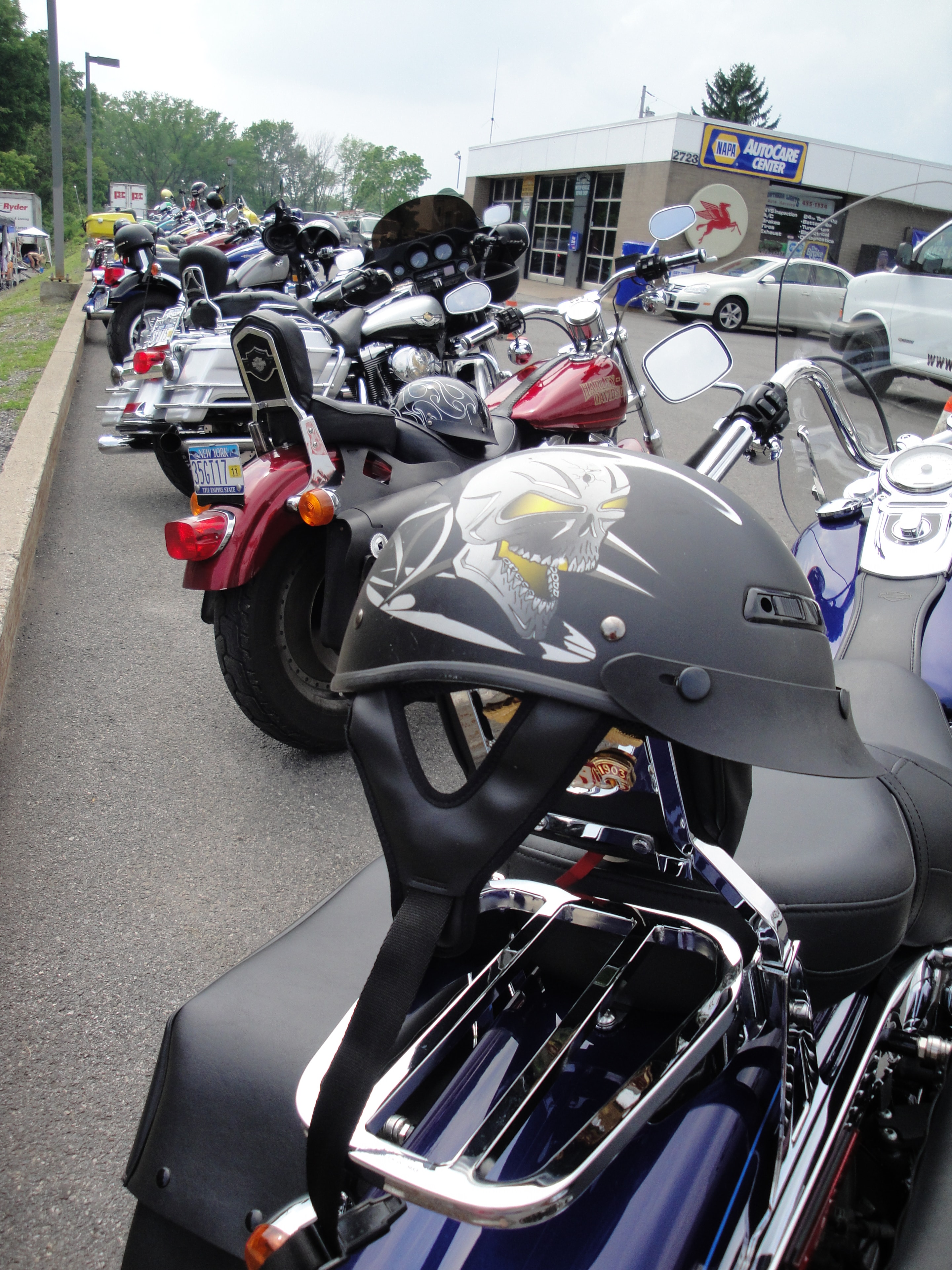 Higie's Iron Horse Saloon Summer BBQ Series — motorcycles lined up in parking lot with airbrushed fairing