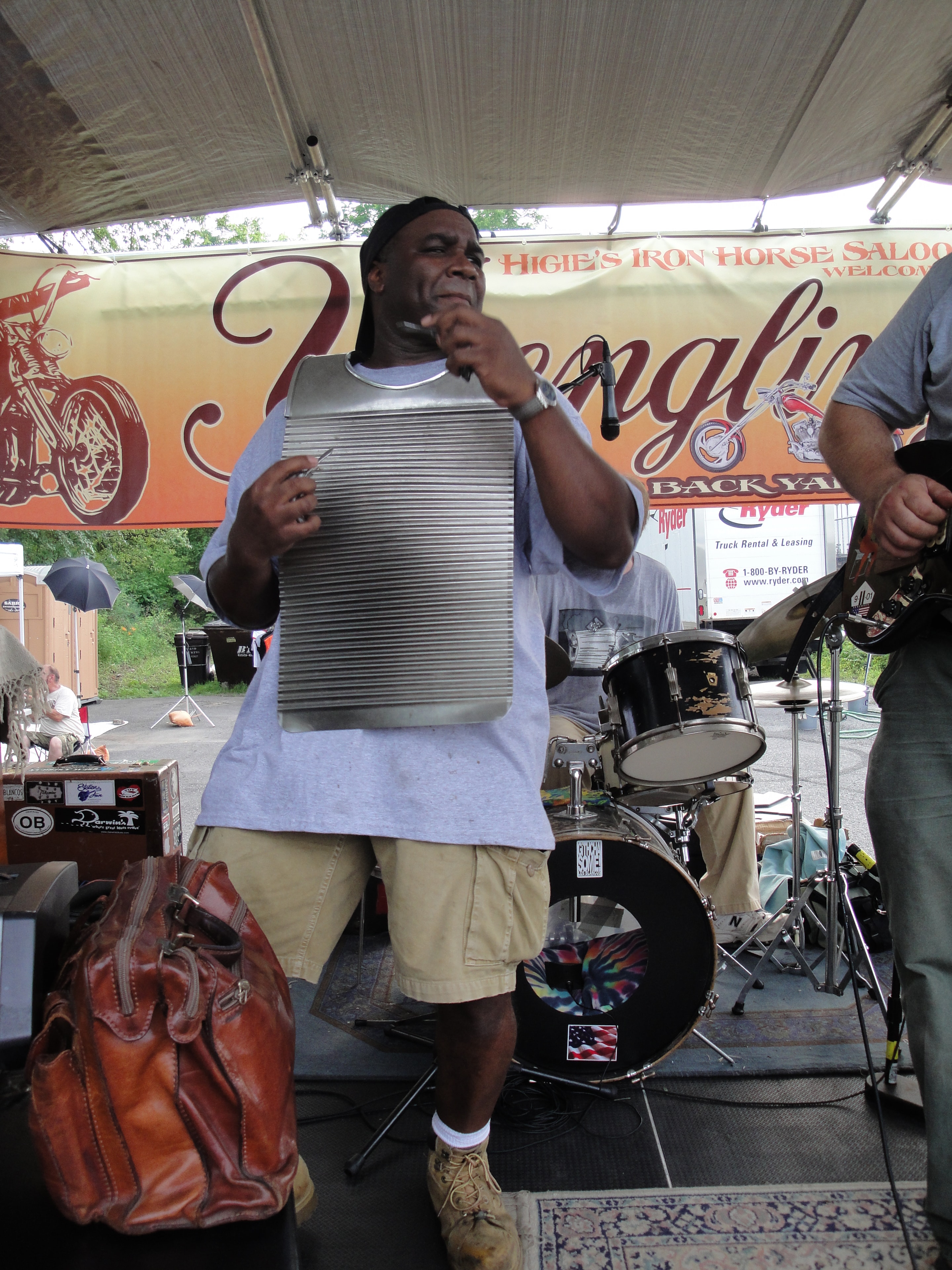 Higie's Iron Horse Saloon Summer BBQ Series — washboard player closeup on stage