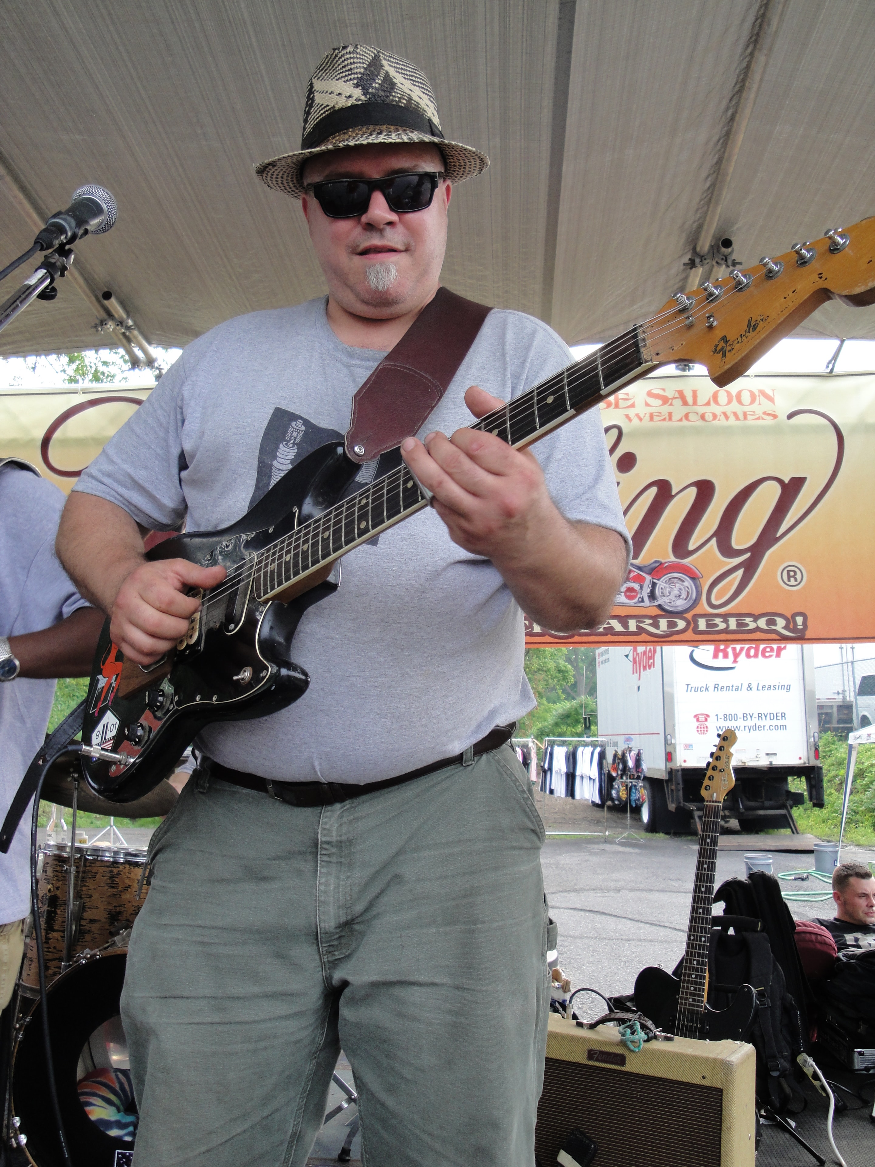 Higie's Iron Horse Saloon Summer BBQ Series — guitarist performing on outdoor stage