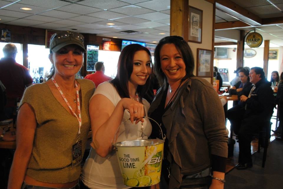 Pearl Street Jam Kick-Start Party — three women with Bud Lime bucket at the bar