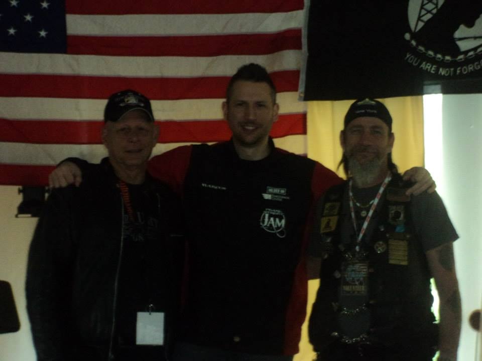 Pearl Street Jam Kick-Start Party — three people posing with American and POW-MIA flags