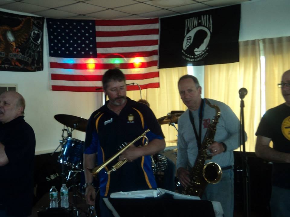 Pearl Street Jam Kick-Start Party — musicians performing with trumpet and saxophone