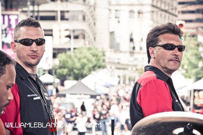 Pearl Street Jam — Marcus and Al Miller surveying crowd from stage