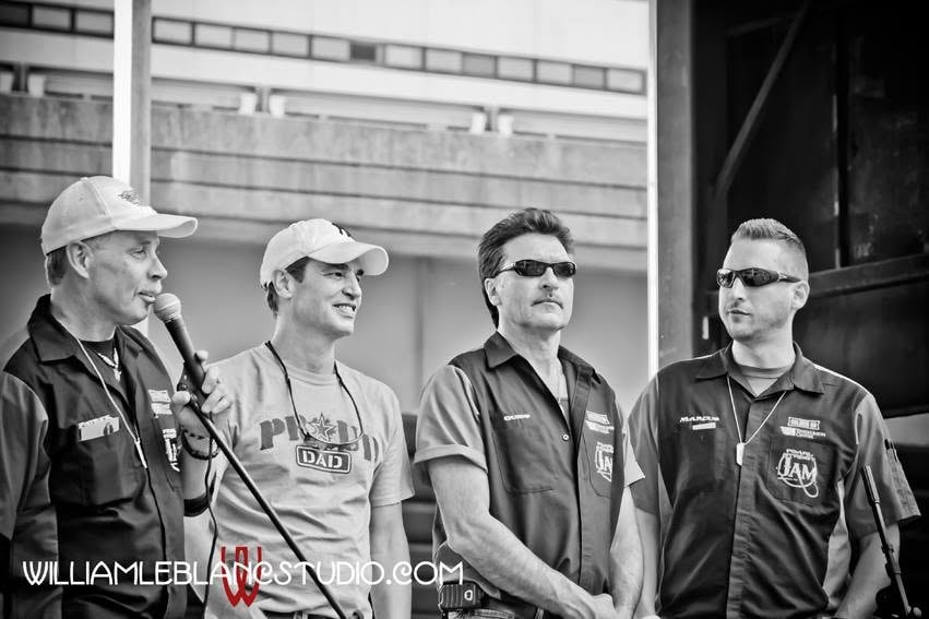 Pearl Street Jam — four crew members on stage in black and white photo