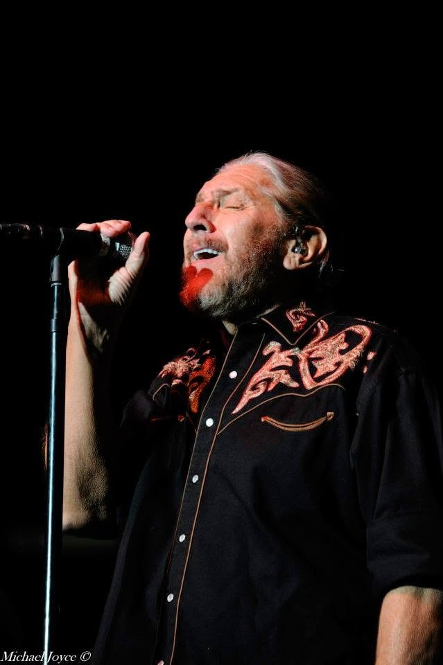 Pearl Street Jam — vocalist performing at microphone on stage