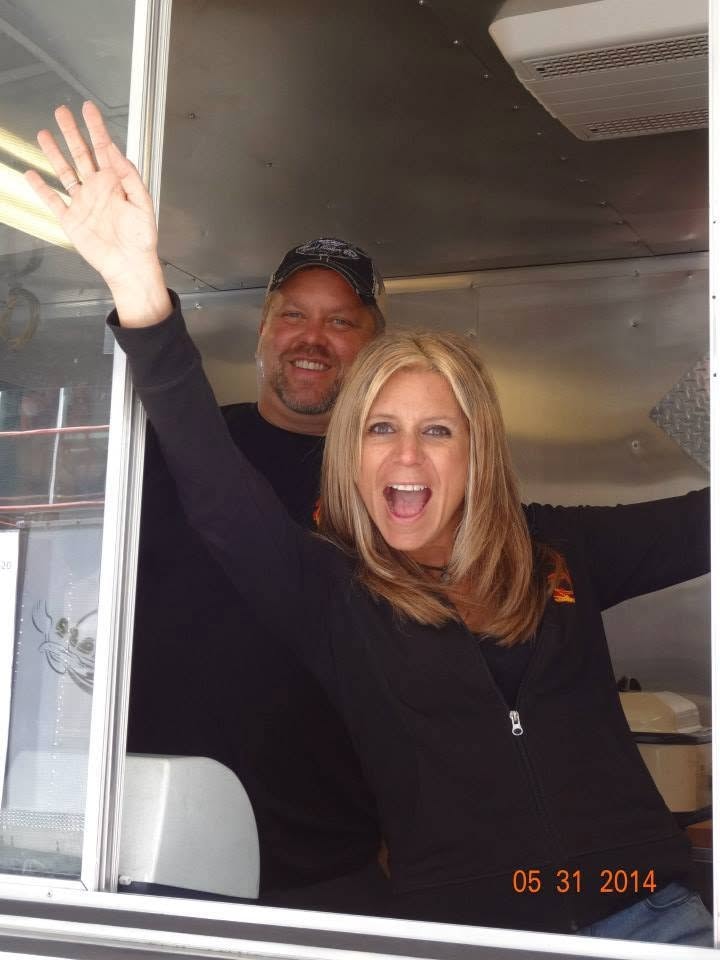 Pearl Street Jam — two crew members waving from event trailer
