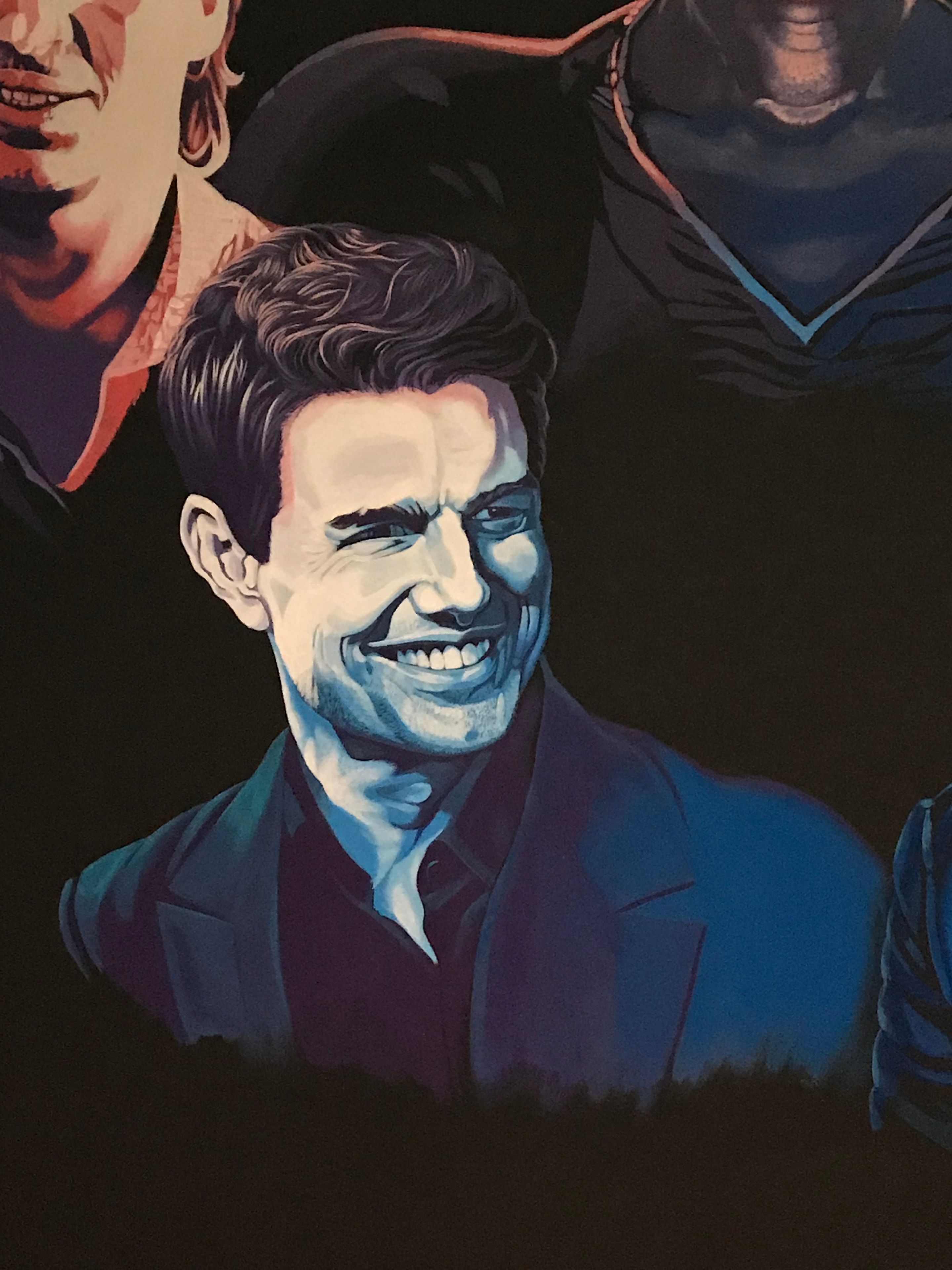 Club 11 mural detail — Tom Cruise portrait close-up with cool blue highlights and dark background